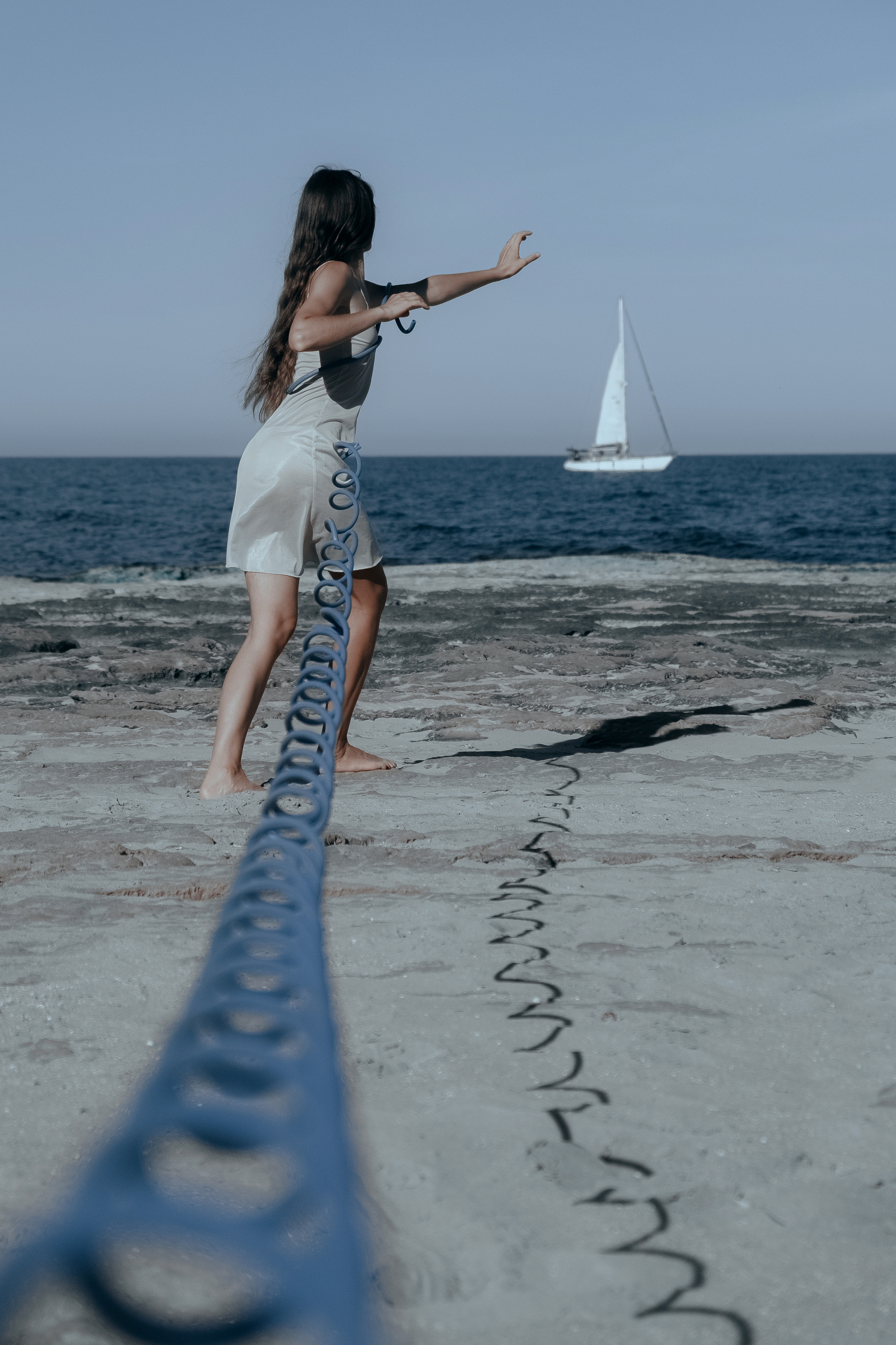Conceptual photo session on a rocky beach