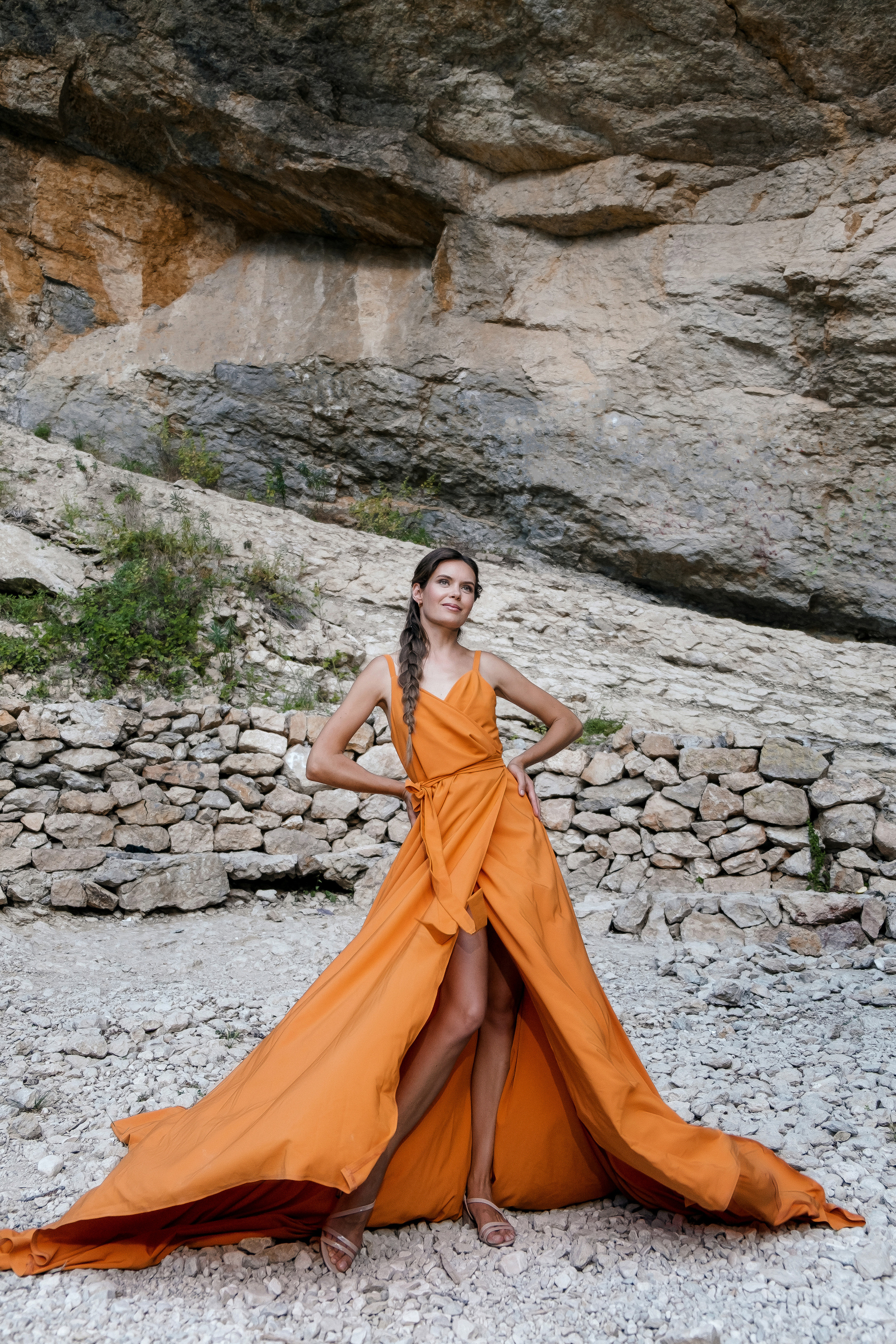 Photoshoot in evening colored dresses by the waterfall