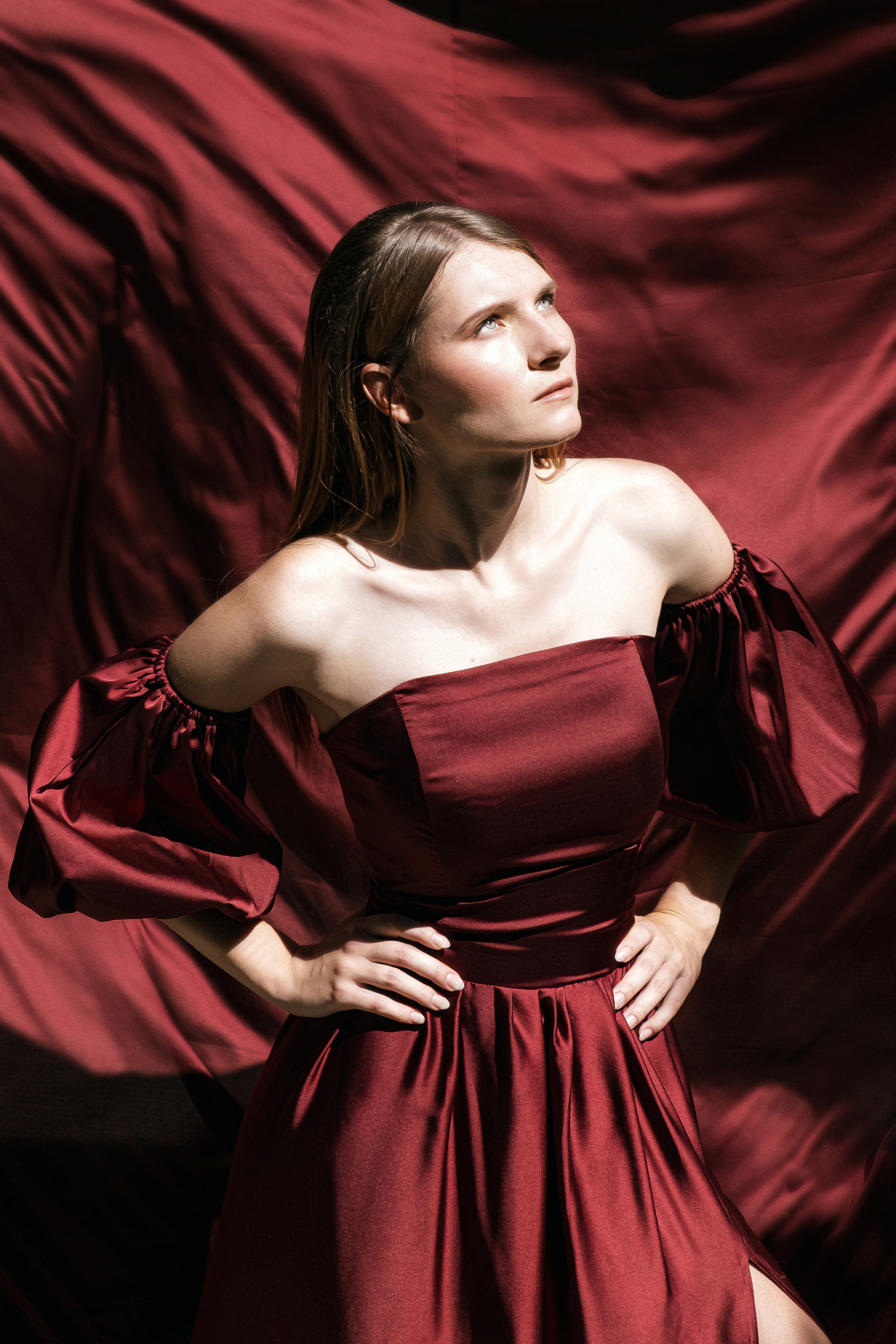 Photoshoot in evening colored dresses by the waterfall