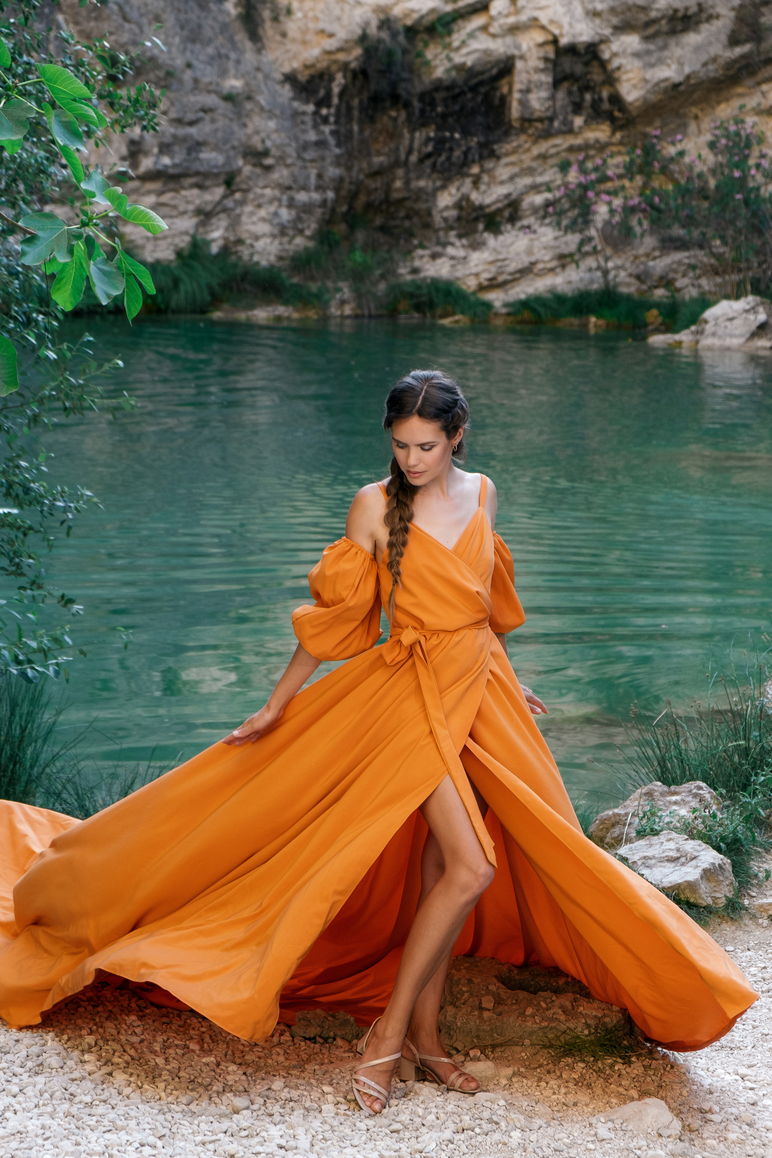 Photoshoot in evening colored dresses by the waterfall