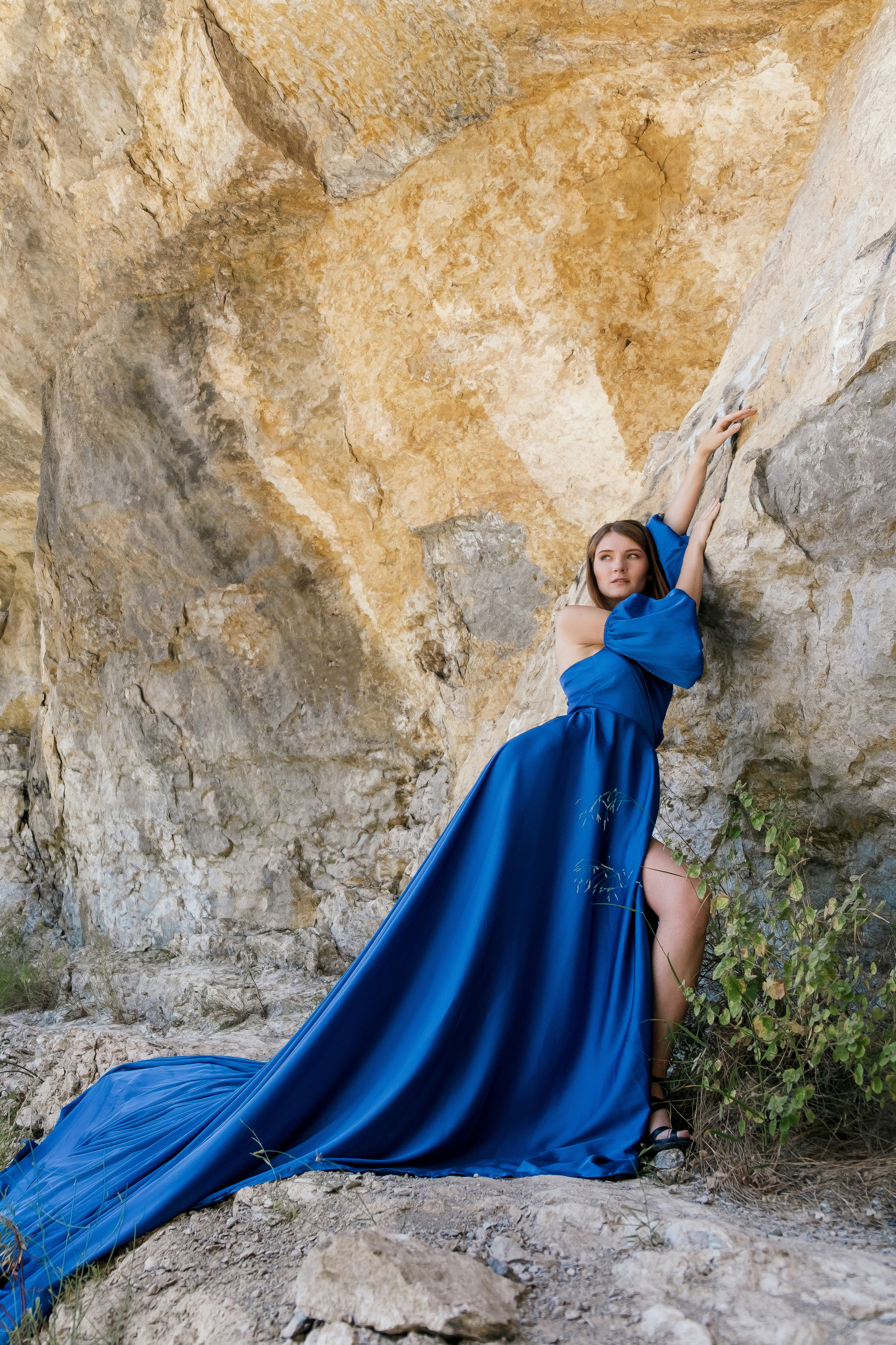 Photoshoot in evening colored dresses by the waterfall
