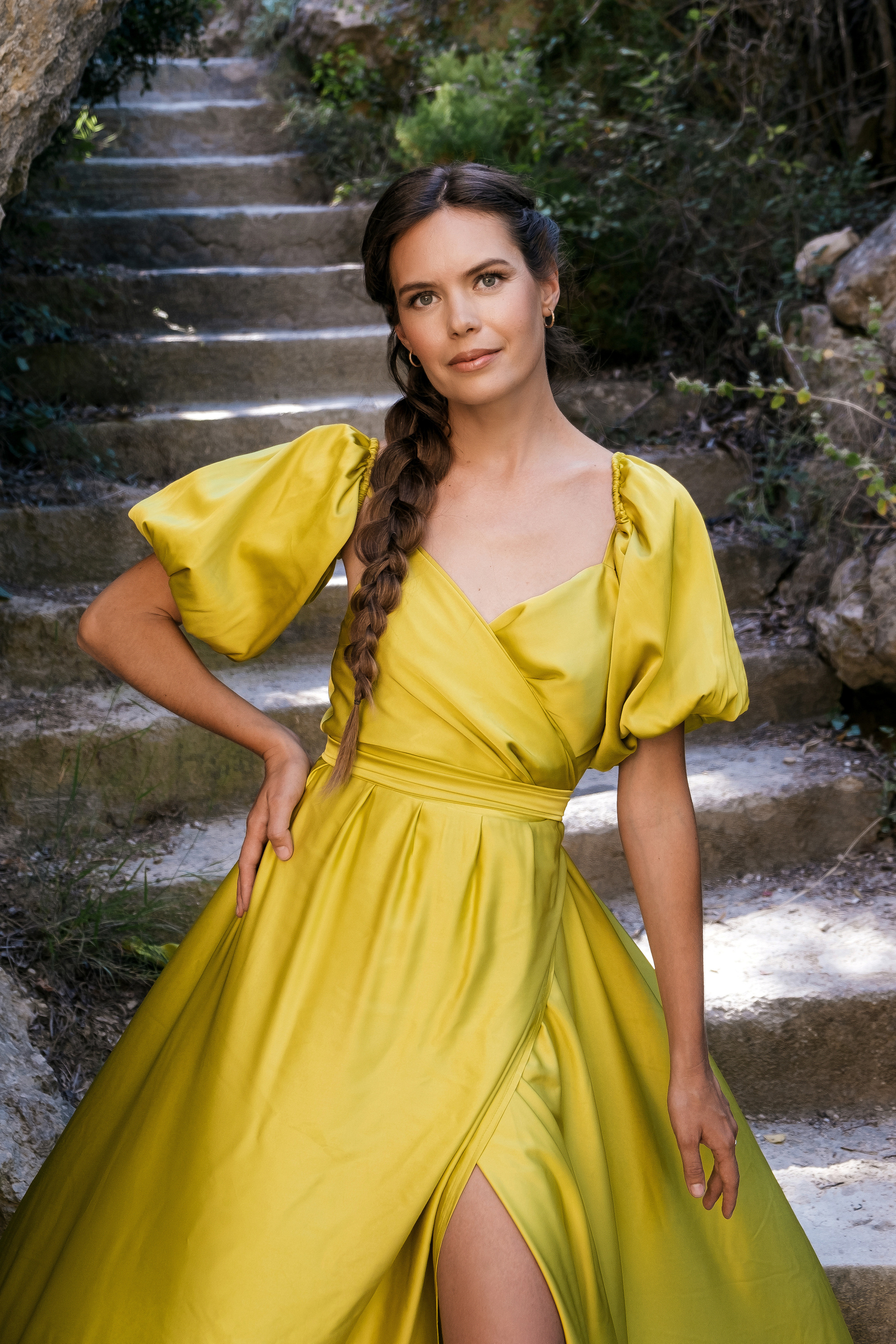 Photoshoot in evening colored dresses by the waterfall