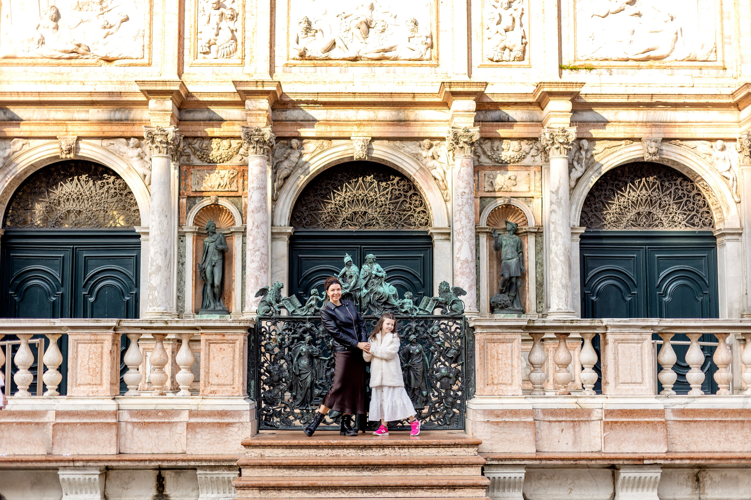 Mother and daughter at sunrise