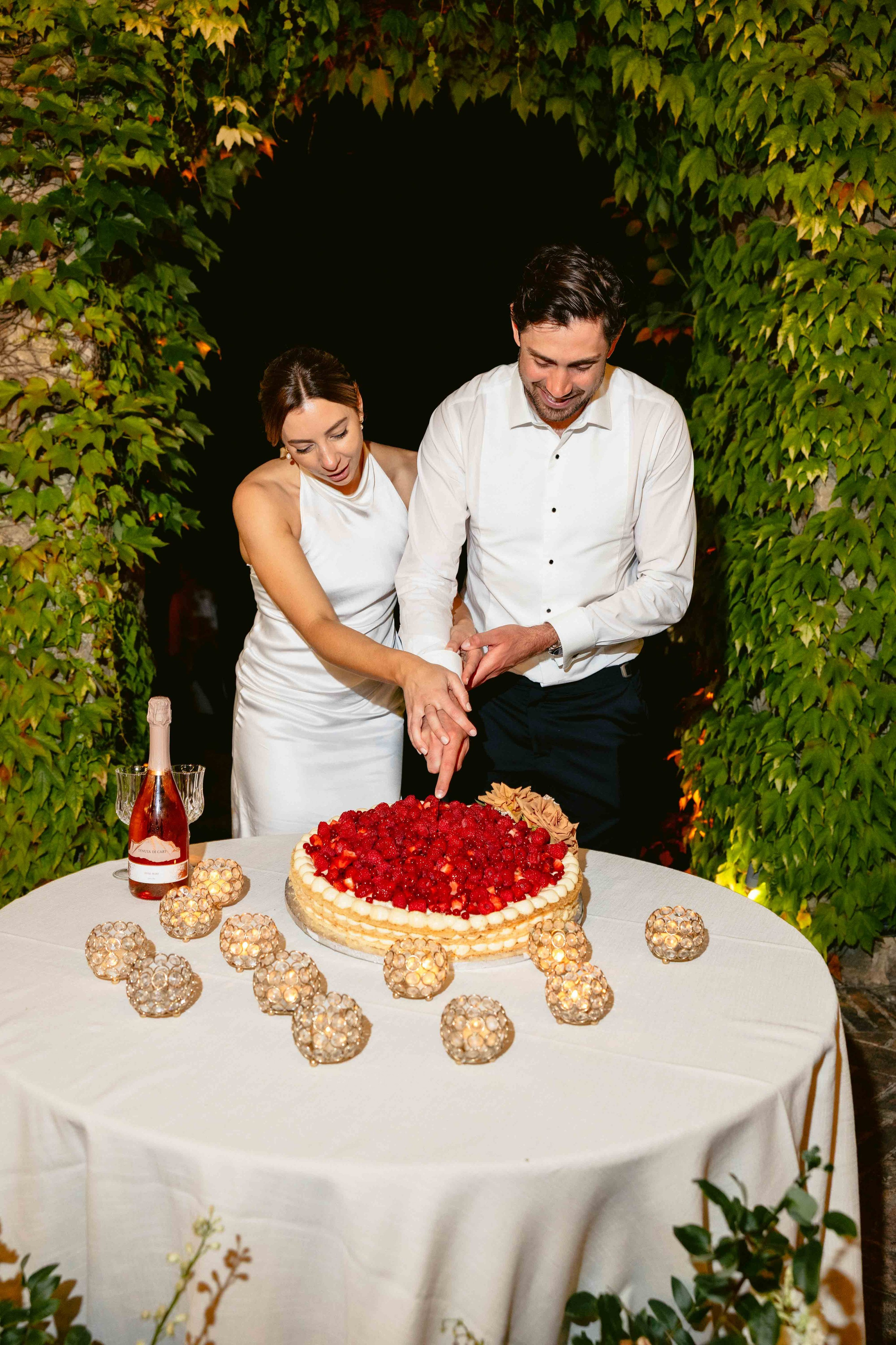 Cake cutting at Borgo Bastia Creti, a wedding venue in Tuscany Umbria