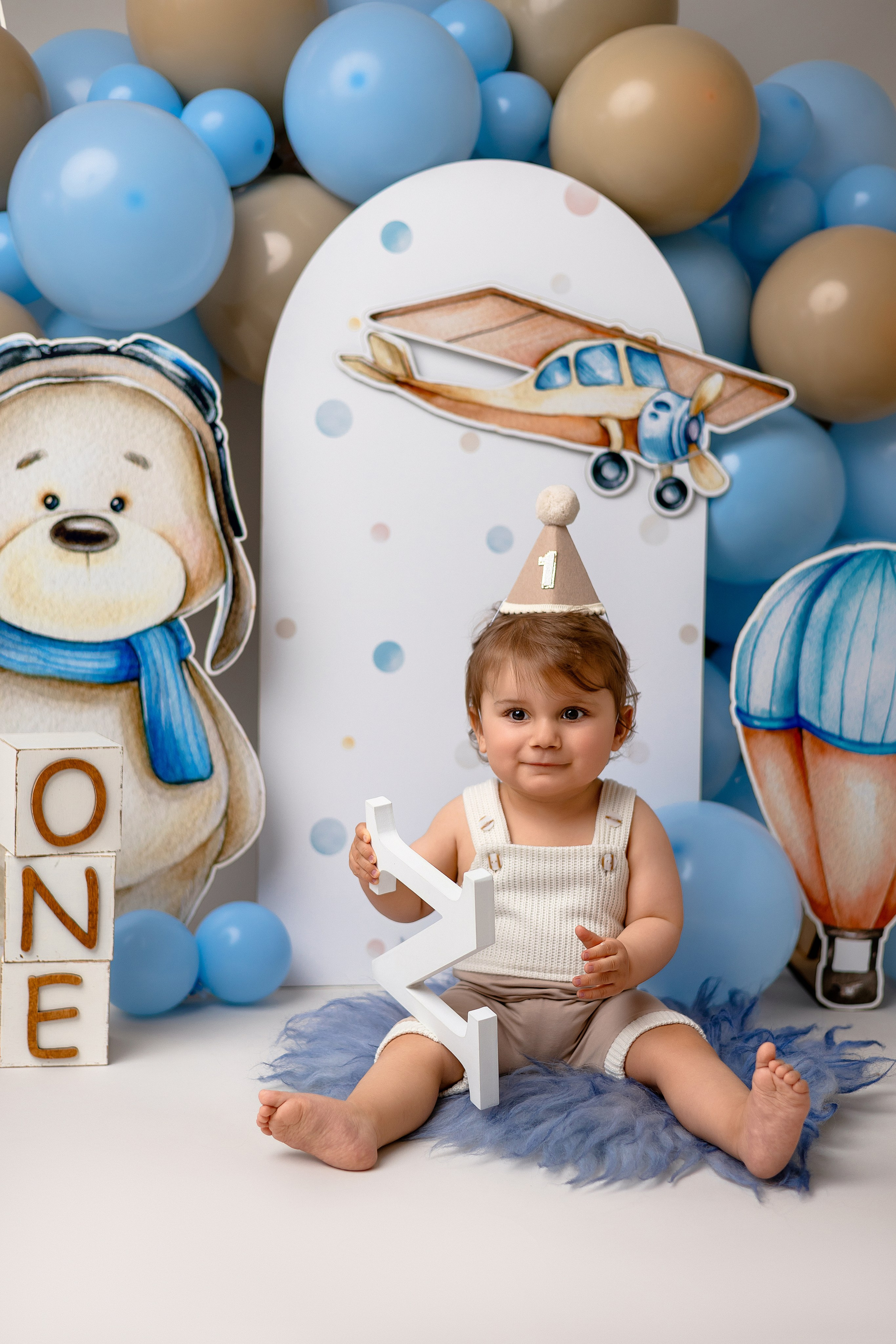 Erste Geburtstag „Cake Smash“. Neugeborene- Schwangerschaft- und Kinder Fotografin in Lehre