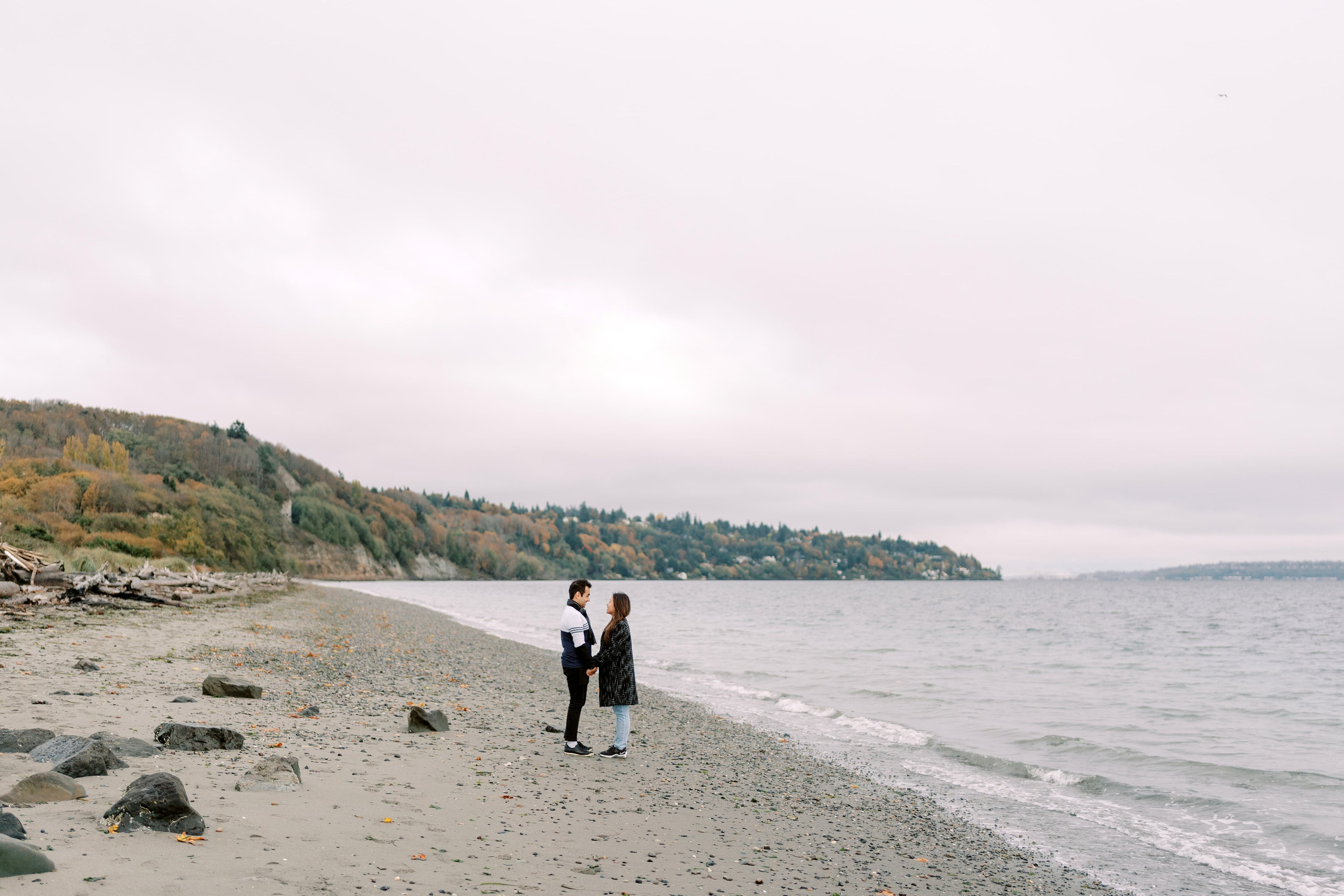 Proposal. December 2024. Alki Point Lighthouse, Washington state. EVAN ARISTOV WEDDING PHOTOGRAPHY — Seattle Wedding Photographer