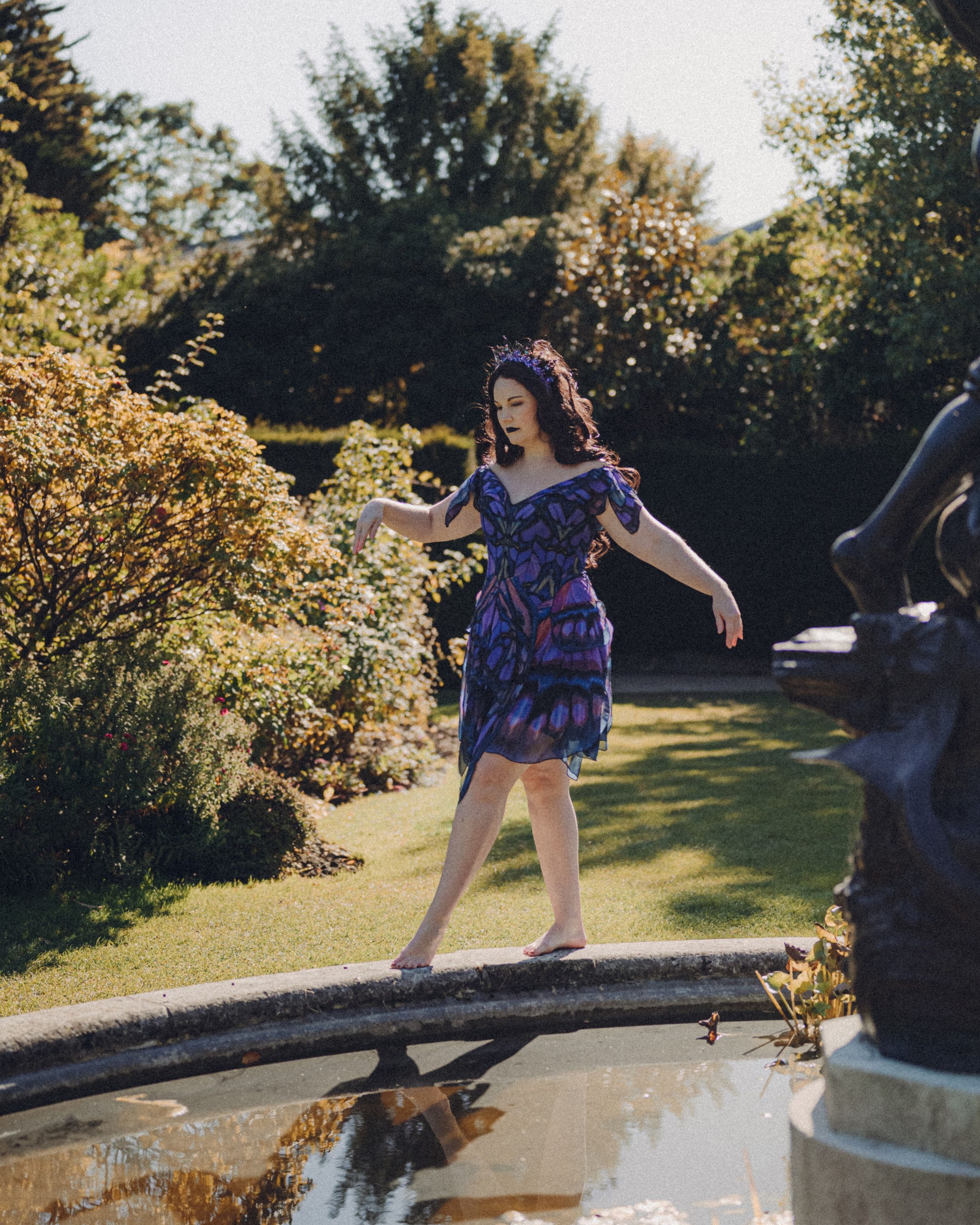 Butterfly purple fairy in a blooming garden. Moth & Moss Photography