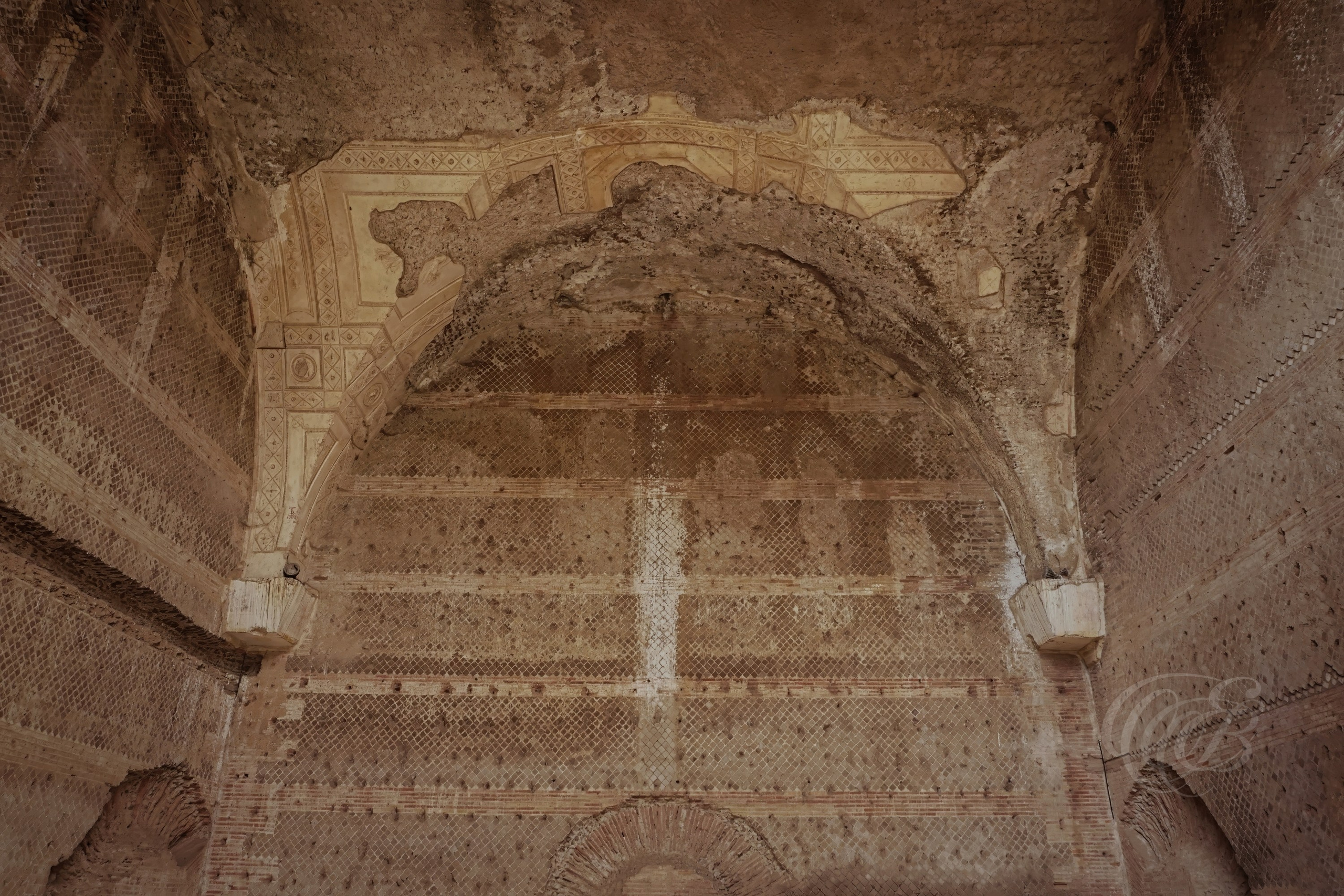The Great Thermae preserve sections of their original vaulted ceilings and decorative architectural details, offering a glimpse into the scale and craftsmanship of one of the principal bathing complexes within Hadrian's Villa.