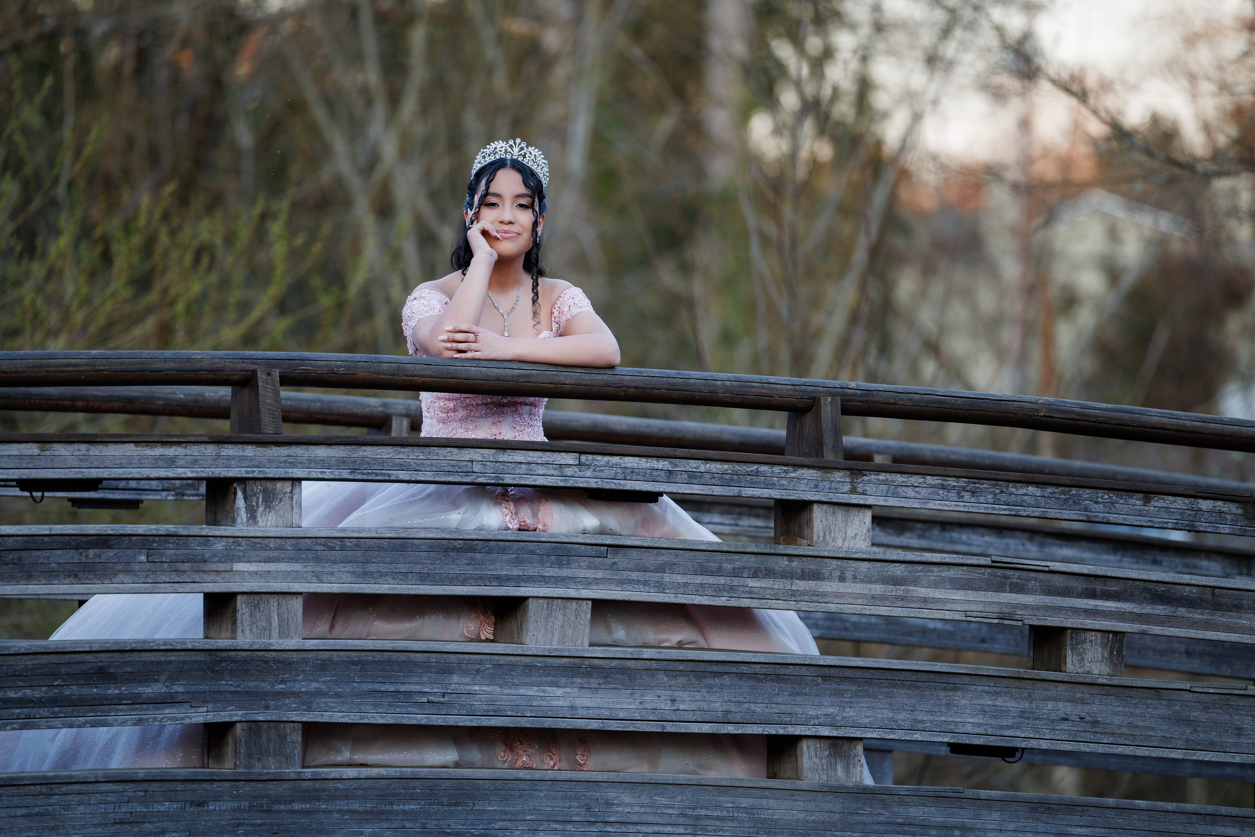 Quinceañera with crown and bouquet during pre-session in gresham oregon captured by Héctor Salazar Photography