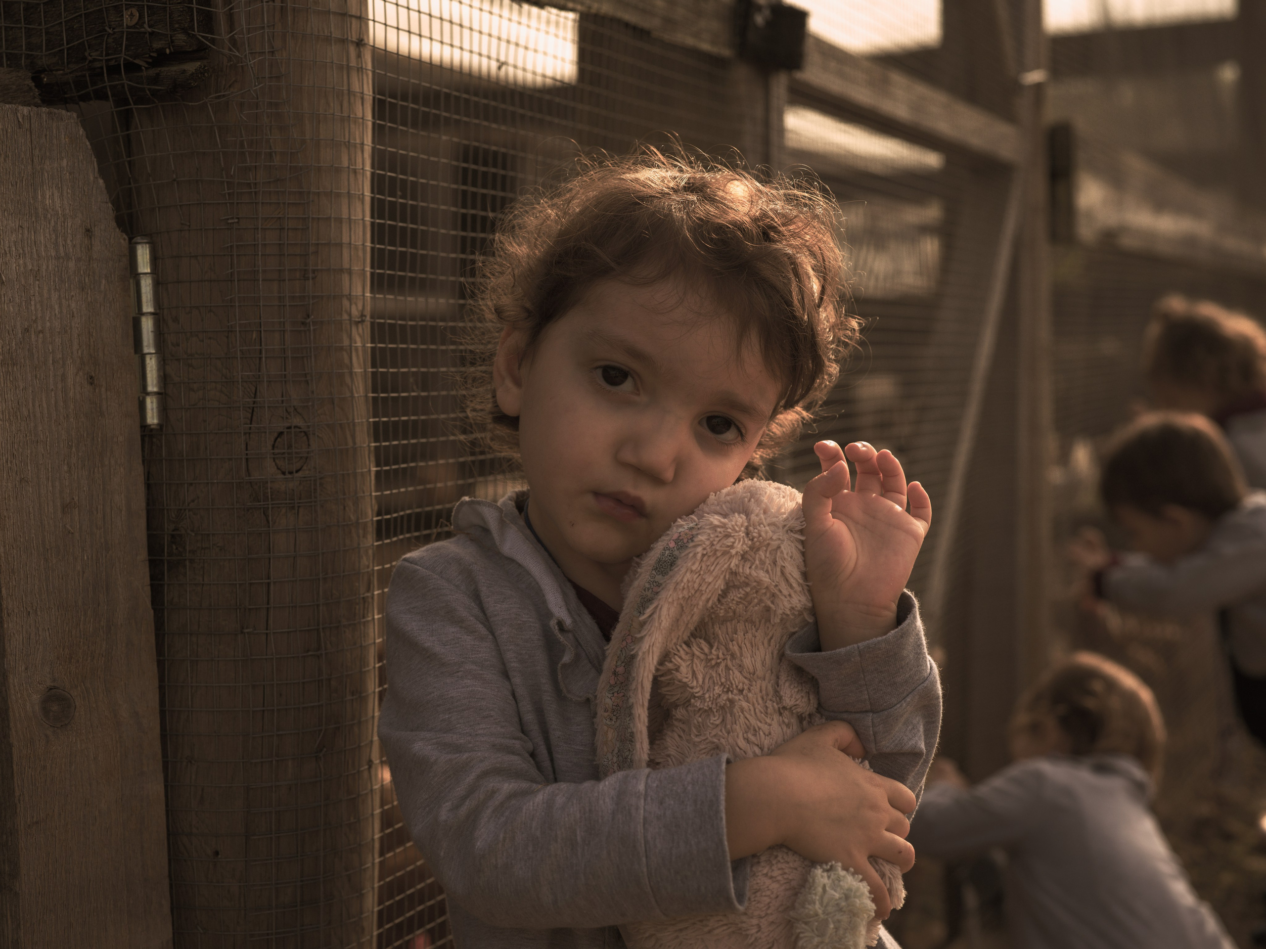 Young Girl with Rabbit and Deep Gaze