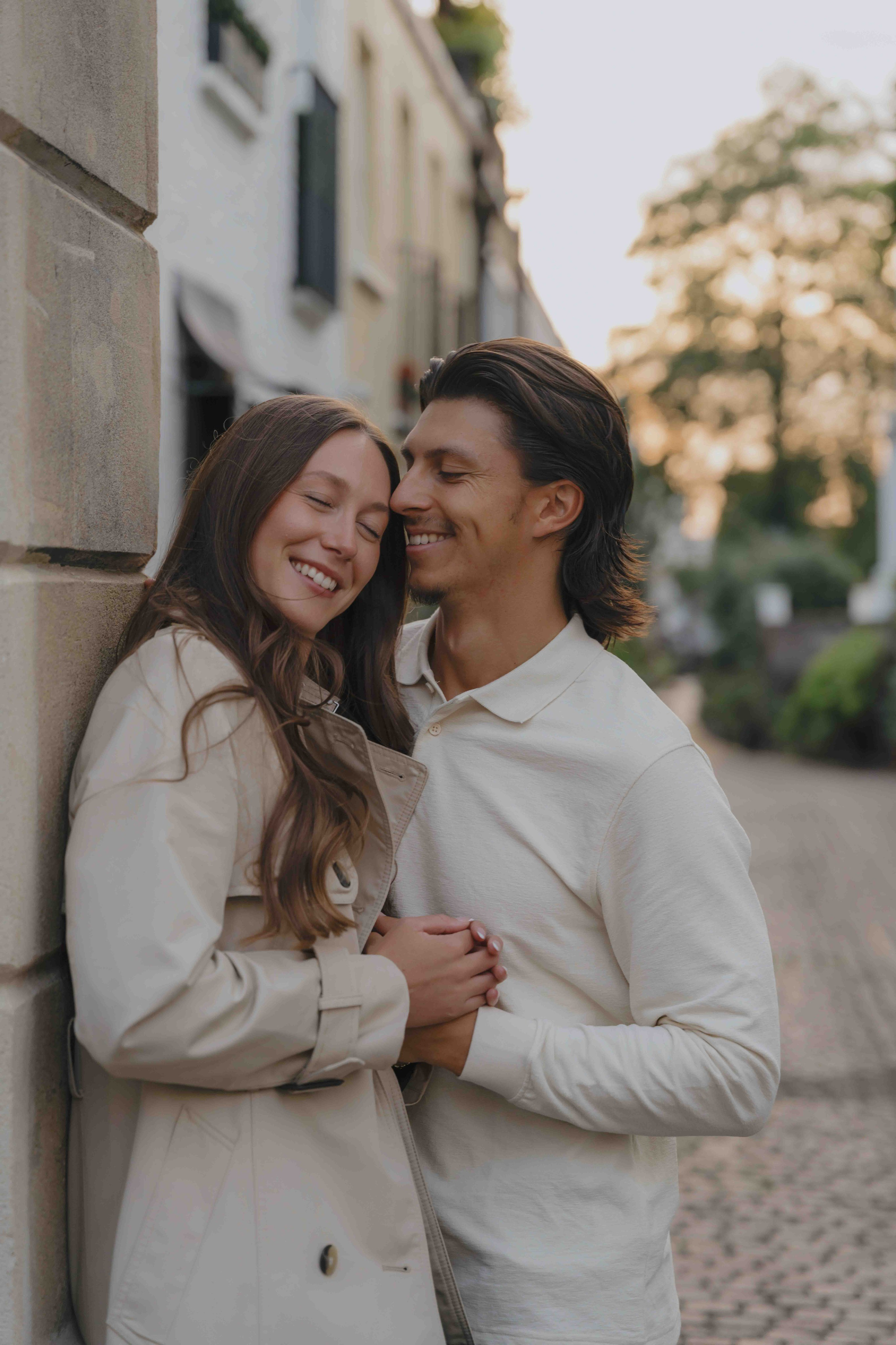 Couple hugging in South Kensington London engagement session natural light