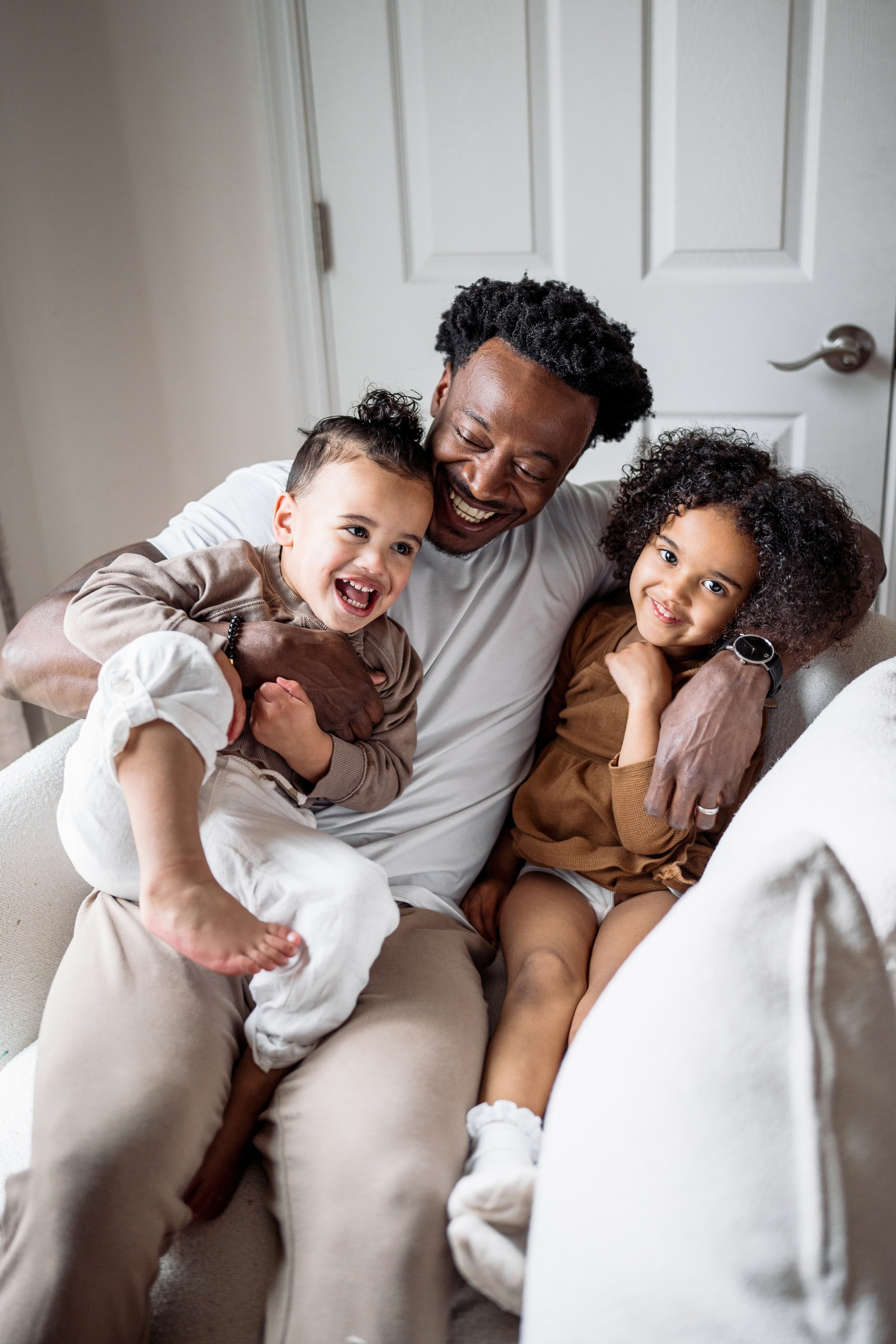 Stephanie, Lamar and kids at home. Wedding and family photographer and videographer PA, NJ, NY, DE, MD