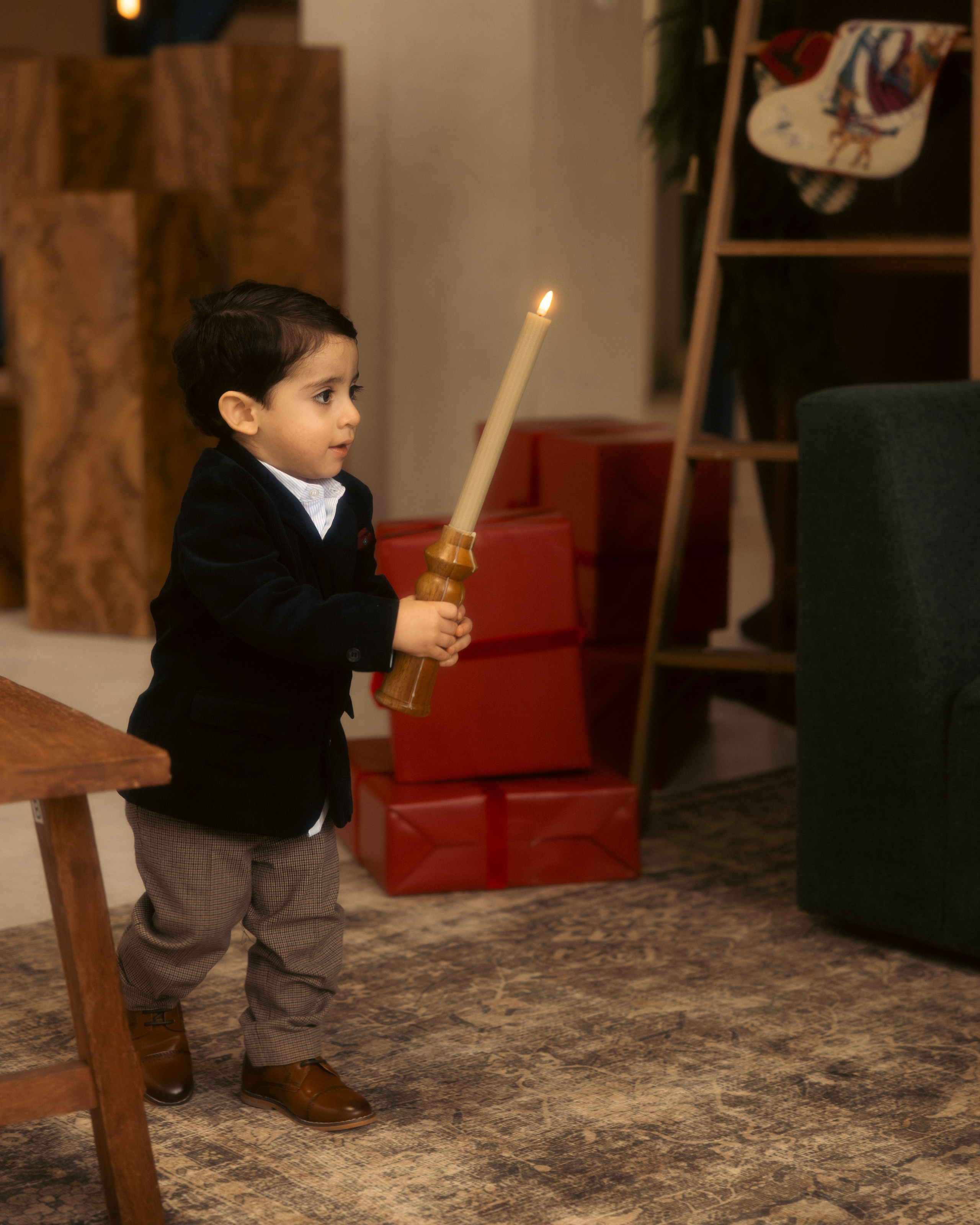 Family opening gift boxes in Christmas studio session