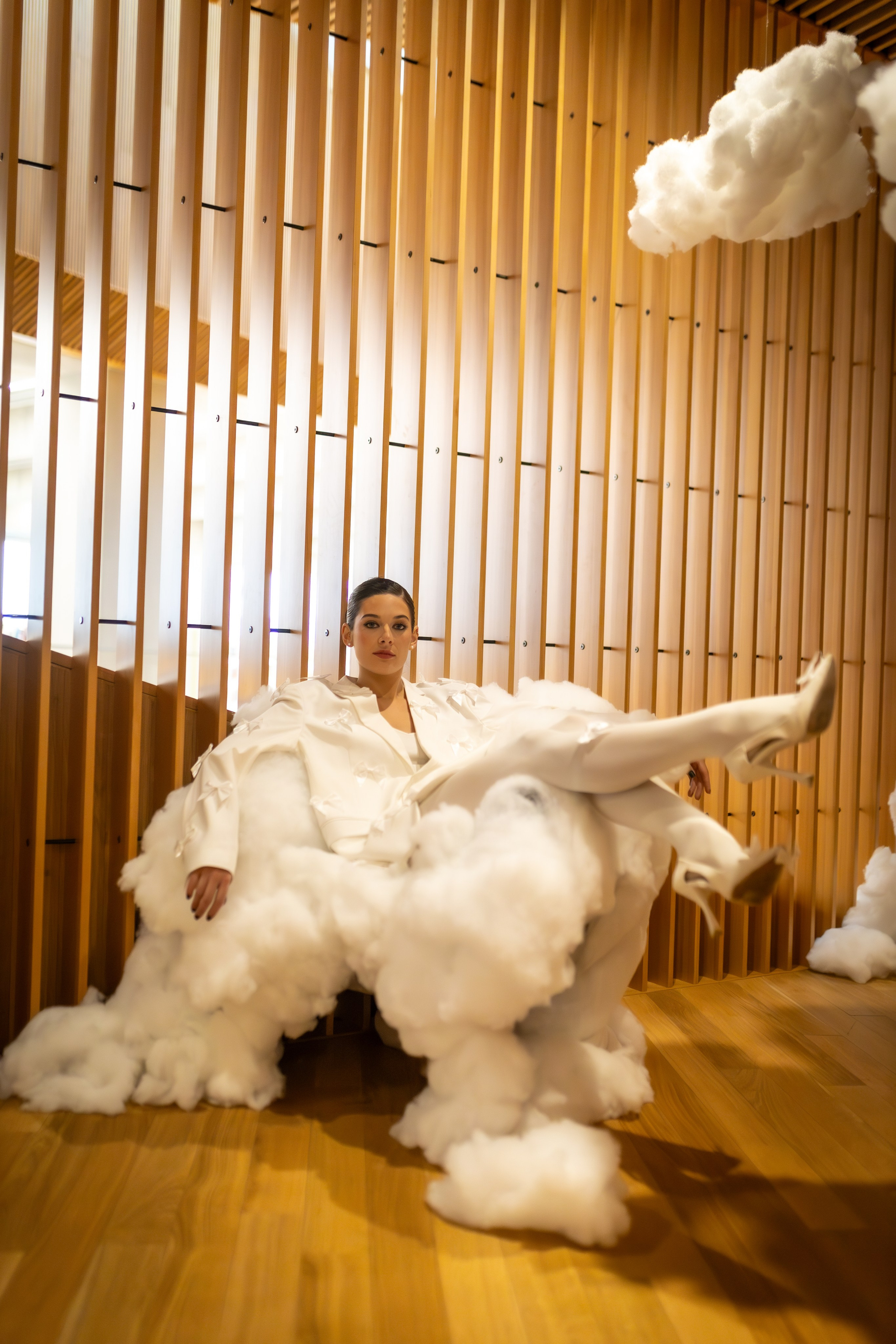 Bold & Timeless: Shelby Morisseau’s Unstoppable Elegance in White. ProFly.club — Professional aerial filming in Calgary