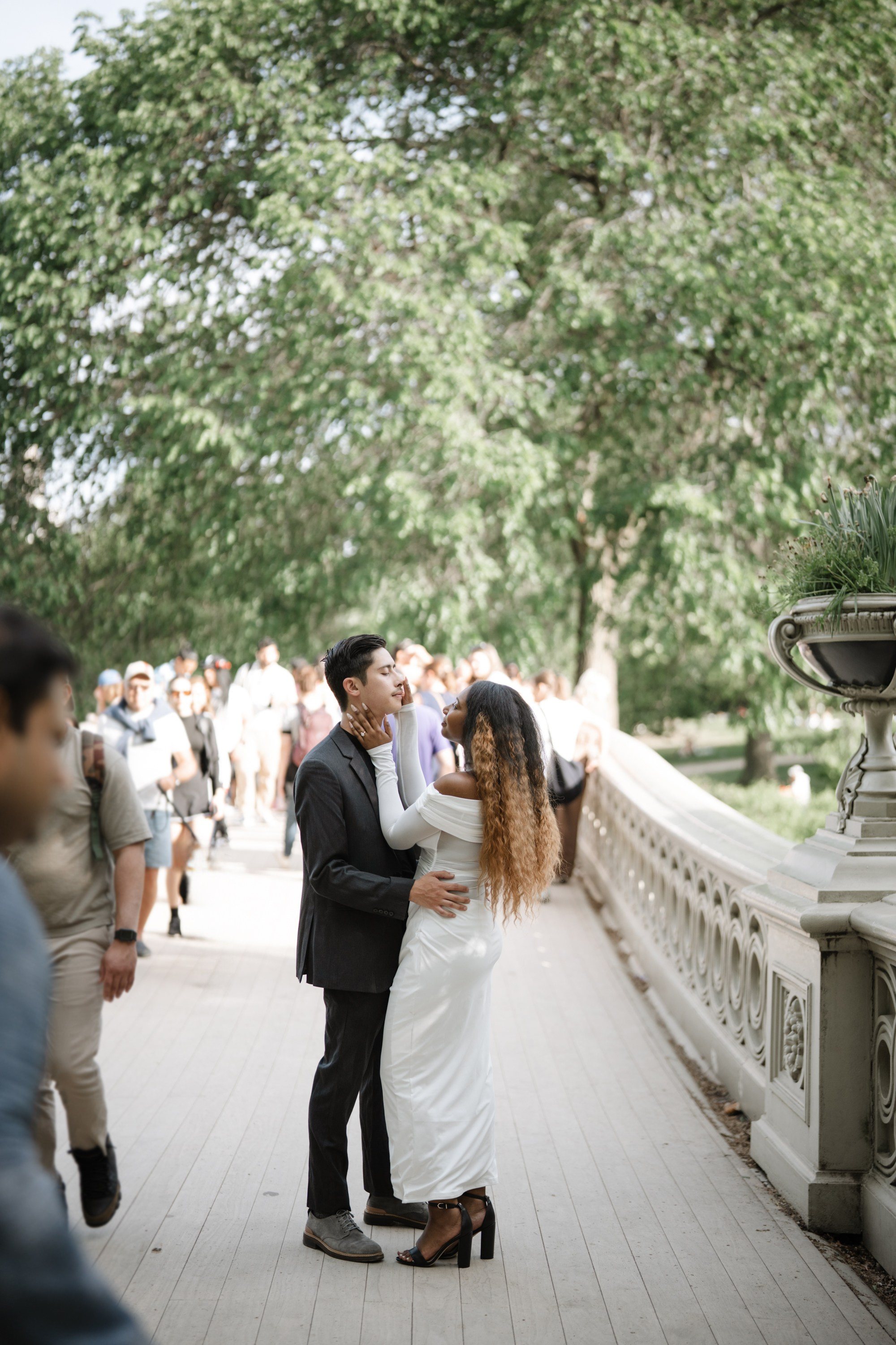 Engagement photo shoot in Central Park in spring. Portrait and wedding photographer in New York