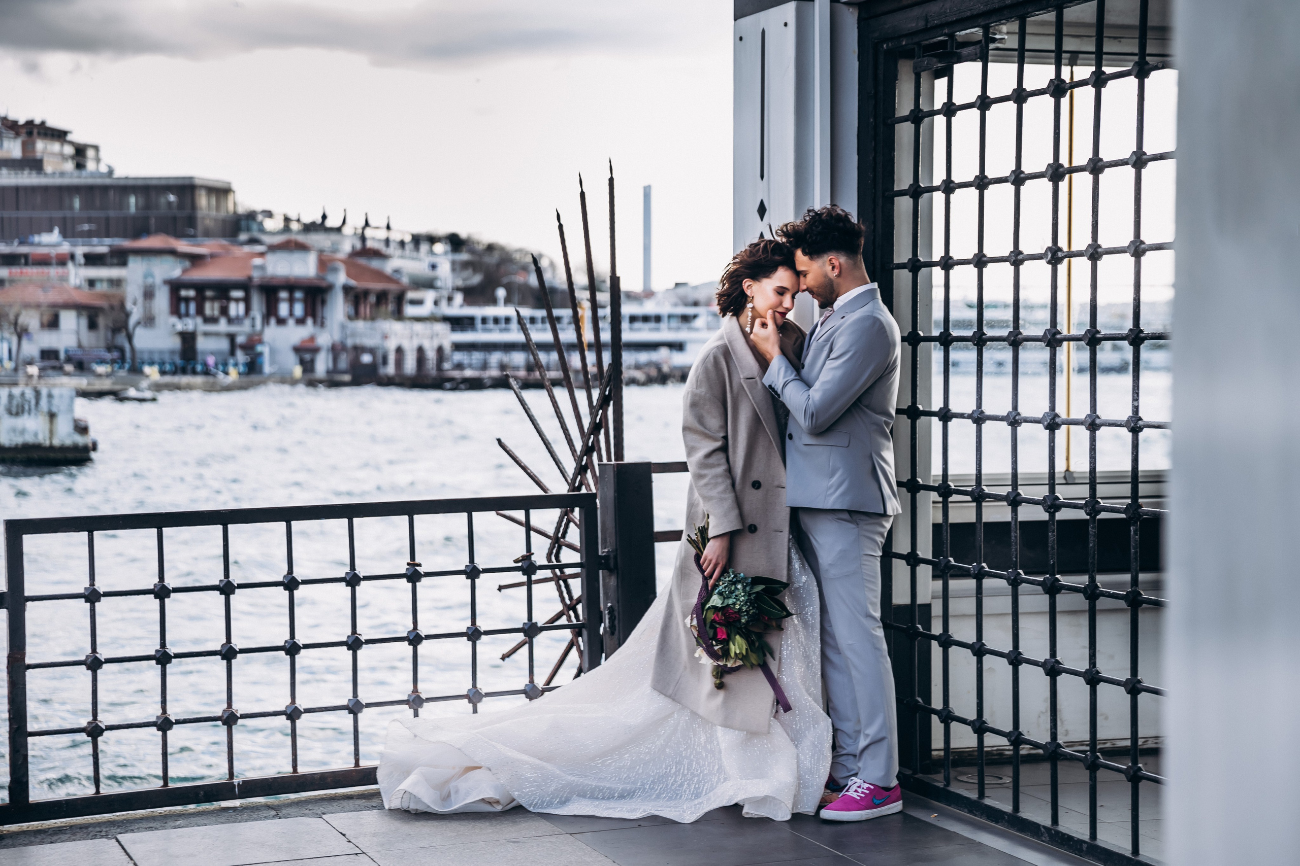 Bride in a white dress by the Bosphorus – wedding photographer in Istanbul and Lake Como, Italy.