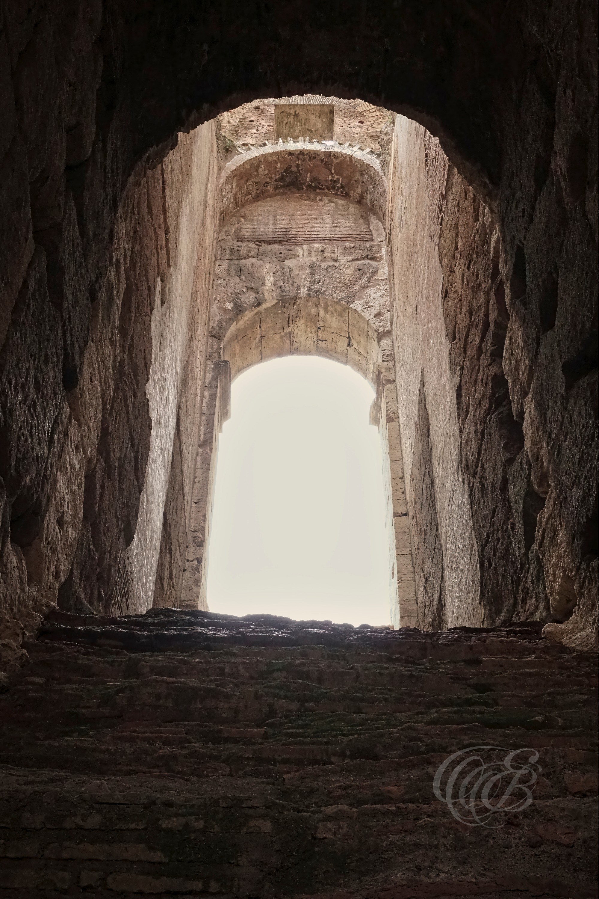 Rome, Italy — Upper Arches of the Colosseum — Eduardo Bartoli Photography — Photograph of upper-level arches within the Colosseum, historic Roman amphitheater showcasing ancient circulation routes and structural engineering in Rome, Italy — Rome, Italy — Upper Arches of the Colosseum — Eduardo Bartoli Photography.