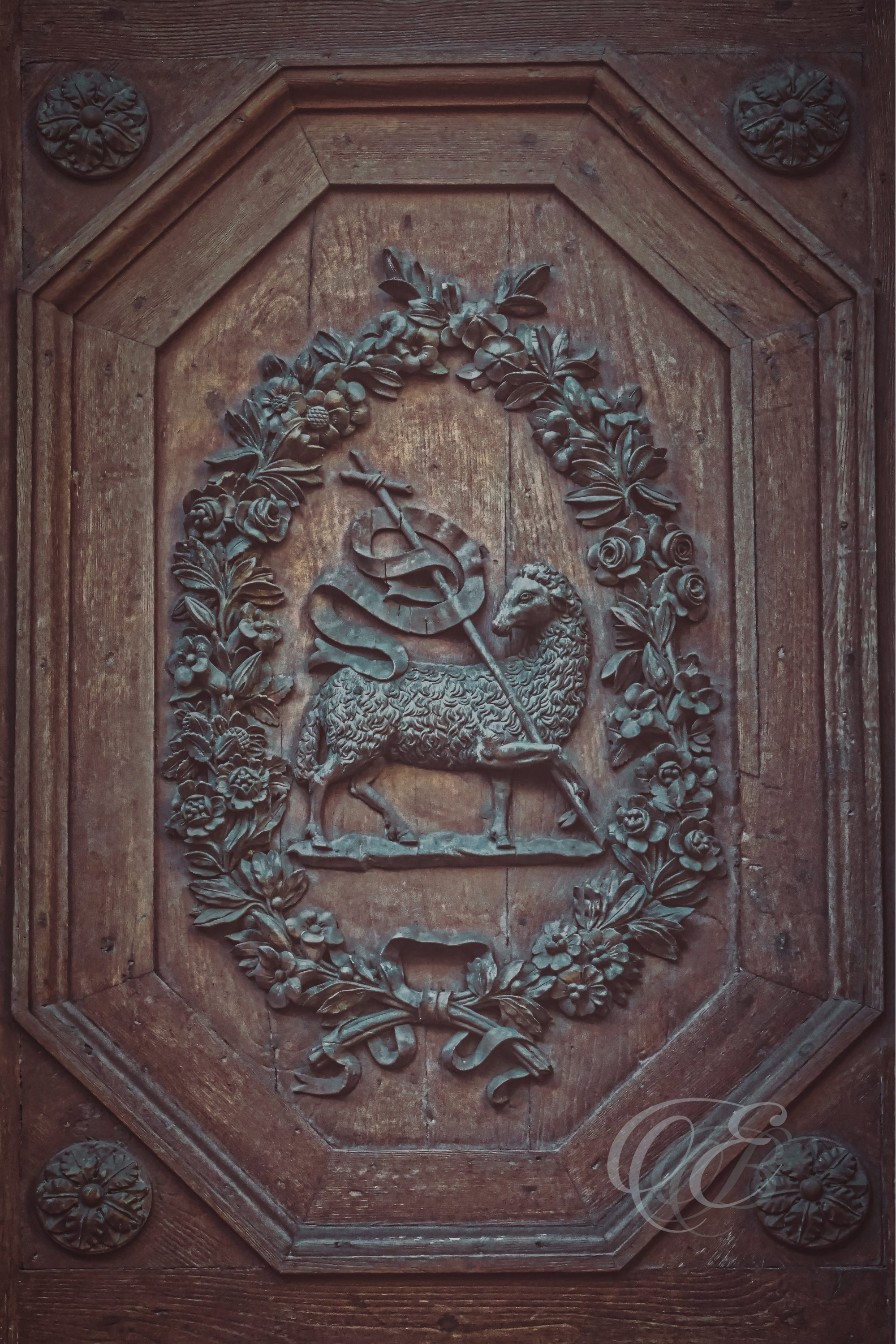 Florence Italy - Agnus Dei - Eduardo Bartoli Fine Art Photography - Bronze relief of the Agnus Dei on an oak door in Florence, Italy – fine art photography by Eduardo Bartoli.