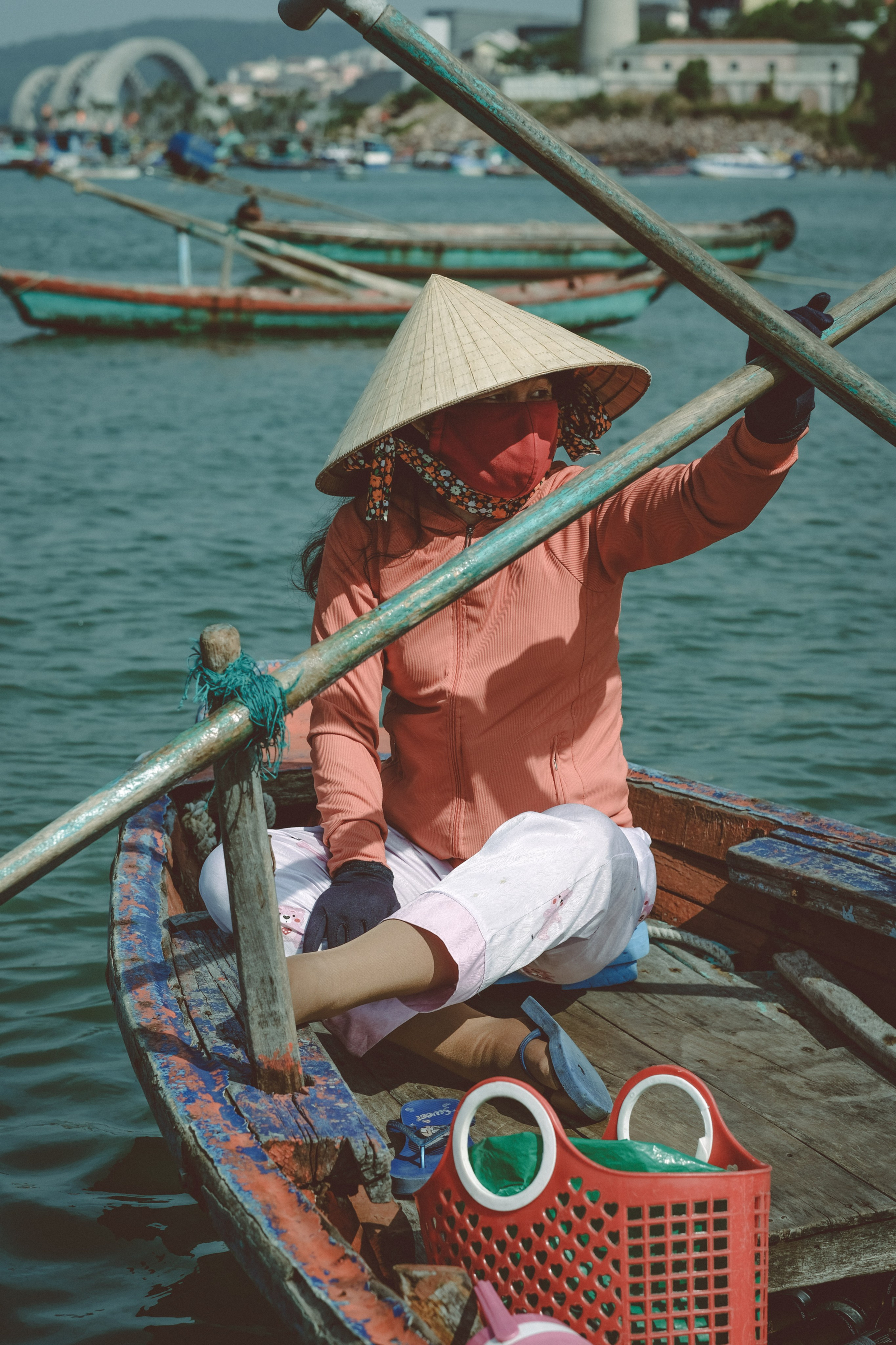 Portrait Vietnamese Girl Sits On Boat on Phu Qouc, Vietnam by Yukophotography