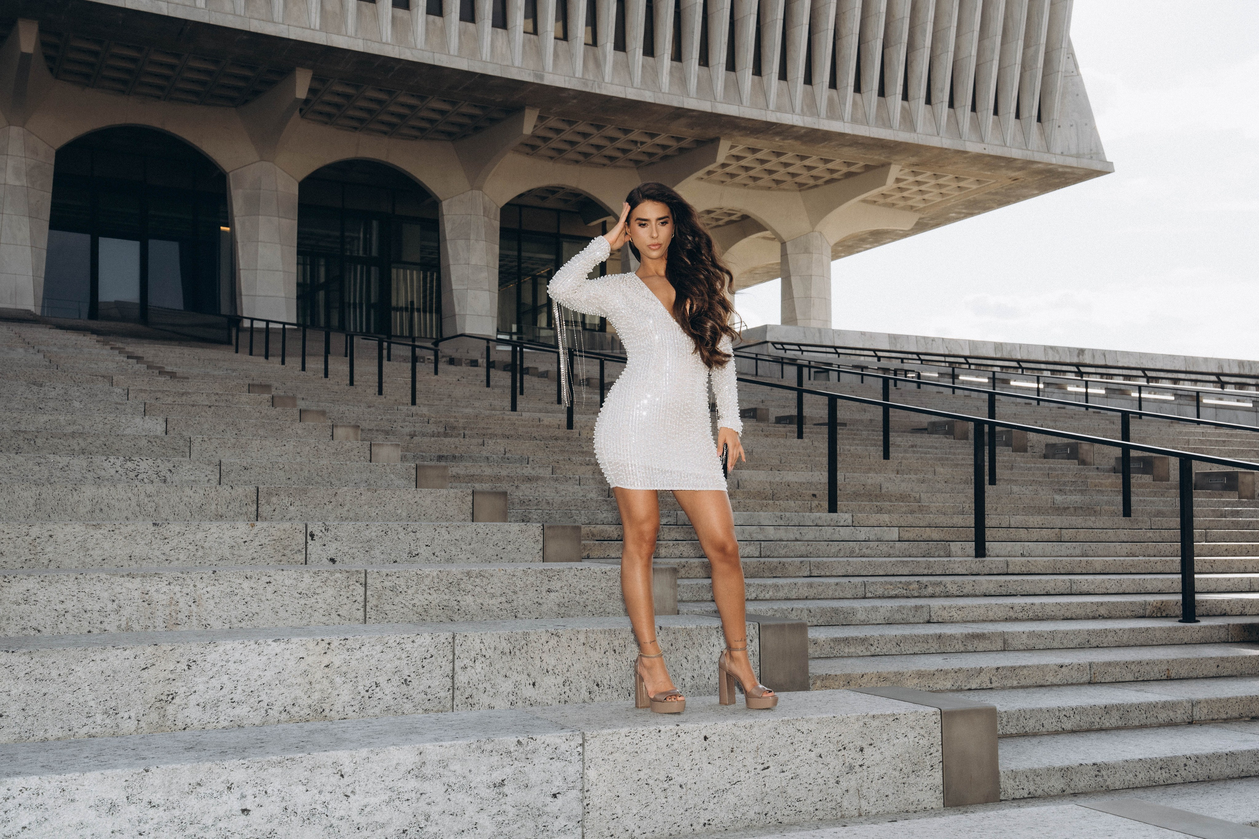 Bride with long veil on Sacandaga Lake dock.