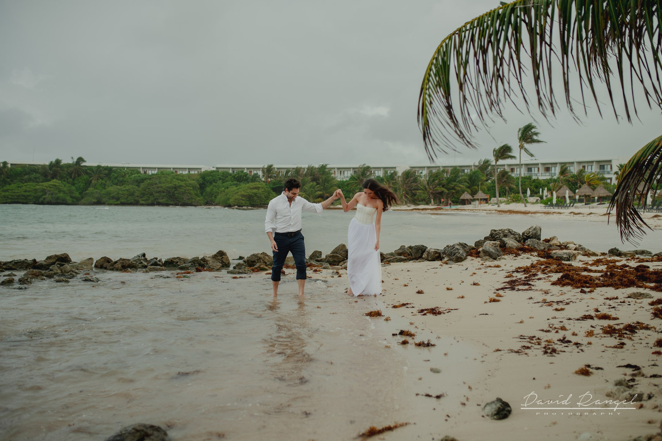 Secilia and Brandon tras the dress at the Conrad Tulum Hotel. Destination wedding photographer based in Cancun and Riviera Maya with service worldwide