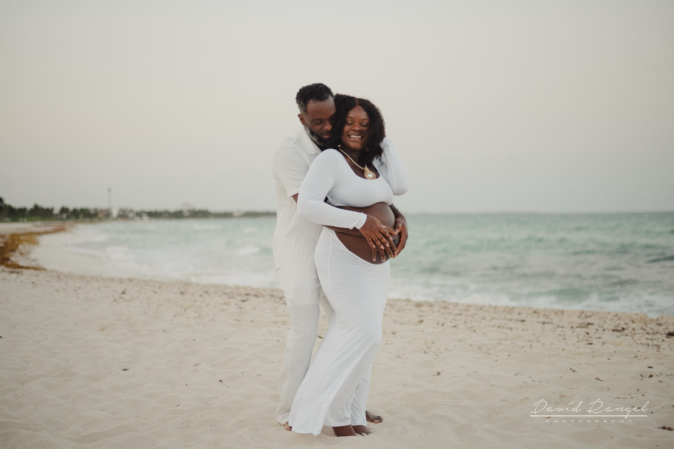 Maternity session of Ketsia & Ricketson at the beautiful colonial-style Valentin Imperial Maya Hotel. Destination wedding photographer based in Cancun and Riviera Maya with service worldwide