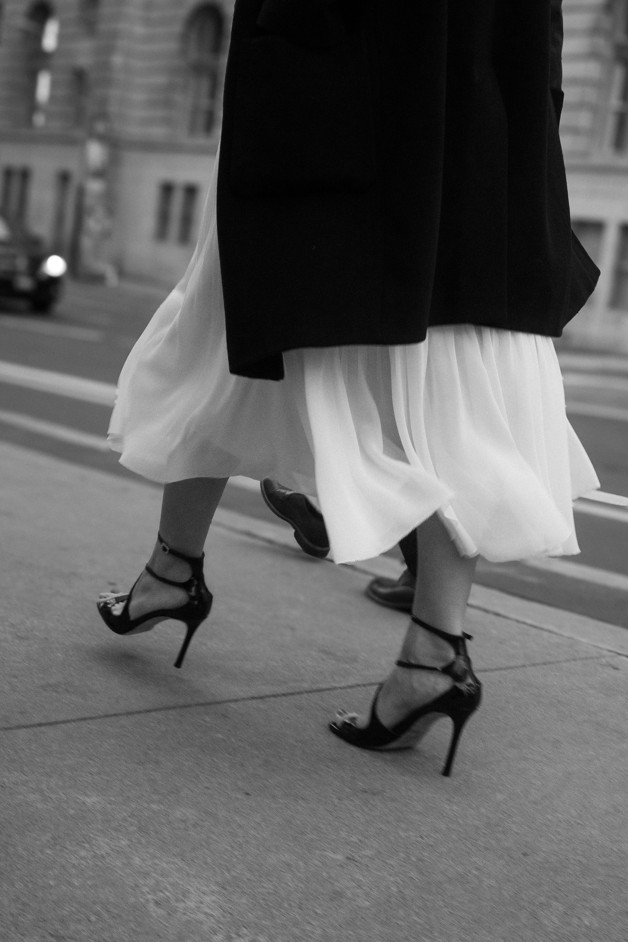 Candid wedding photography in Windsor, Ontario, showcasing emotional moments during a wedding party.