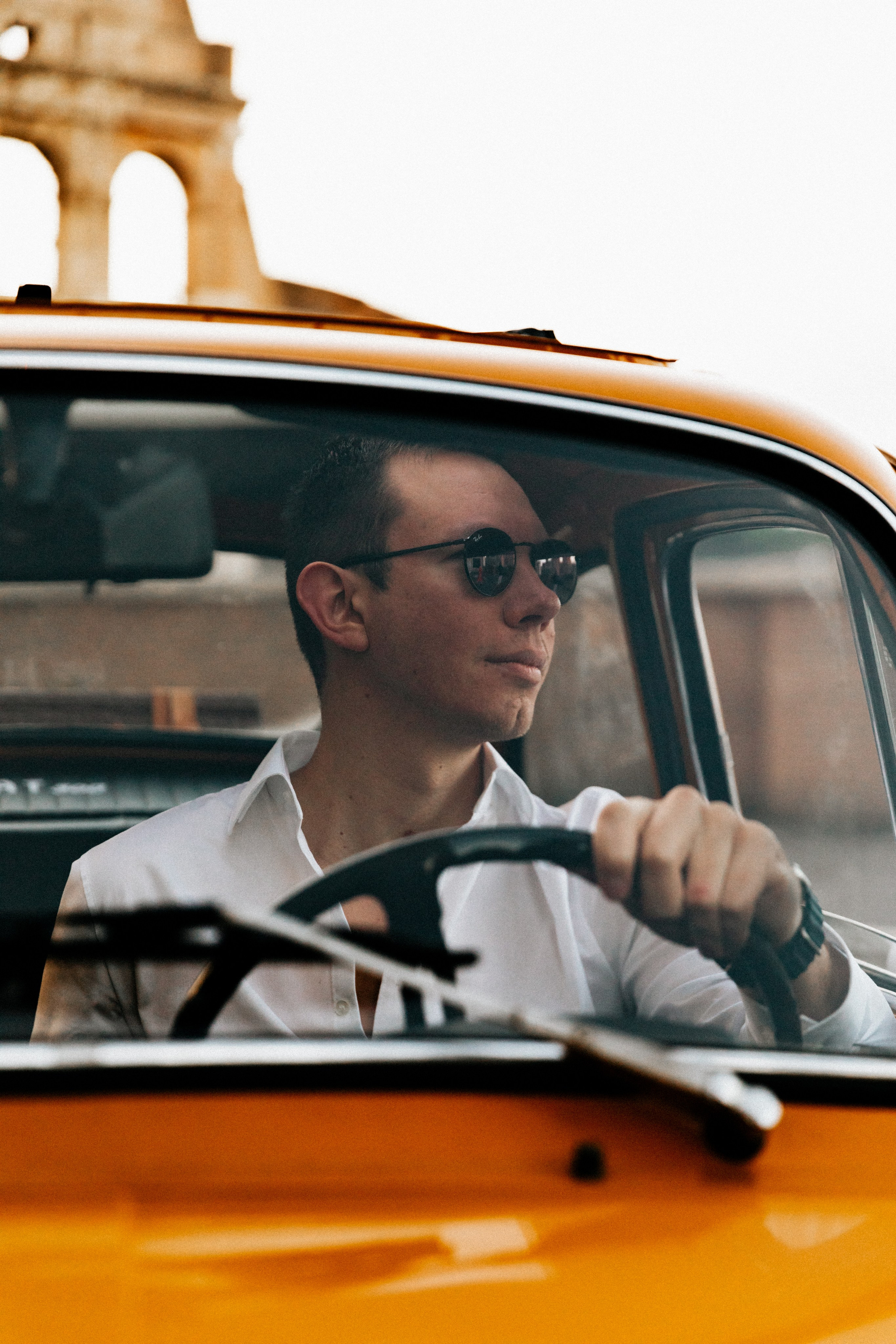 Fiat 500 and Vespa. Photographer in Rome