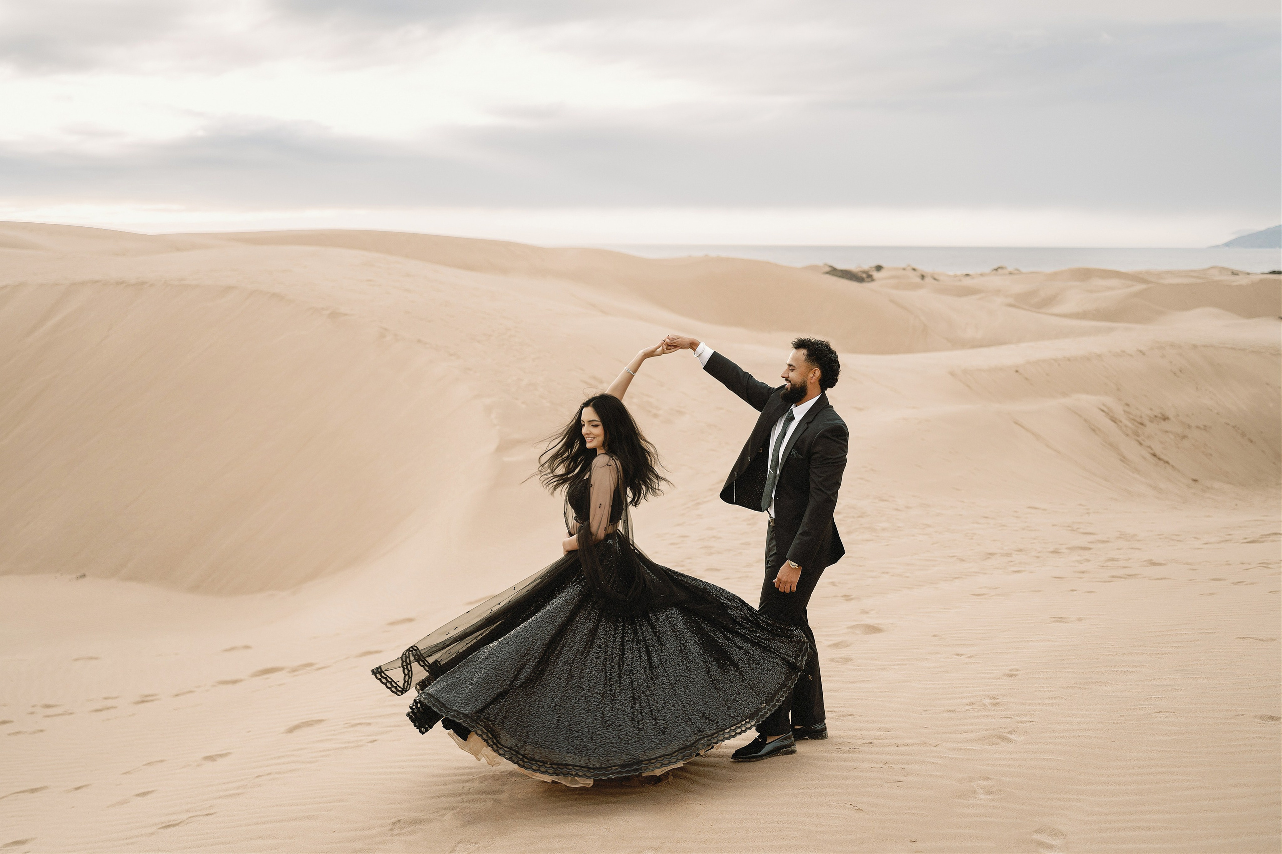 Elopement at Pismo Beach Sand Dunes, California. Wedding Photography & Videography Team in California, Los Angeles, San Francisco, San Diego and Travel