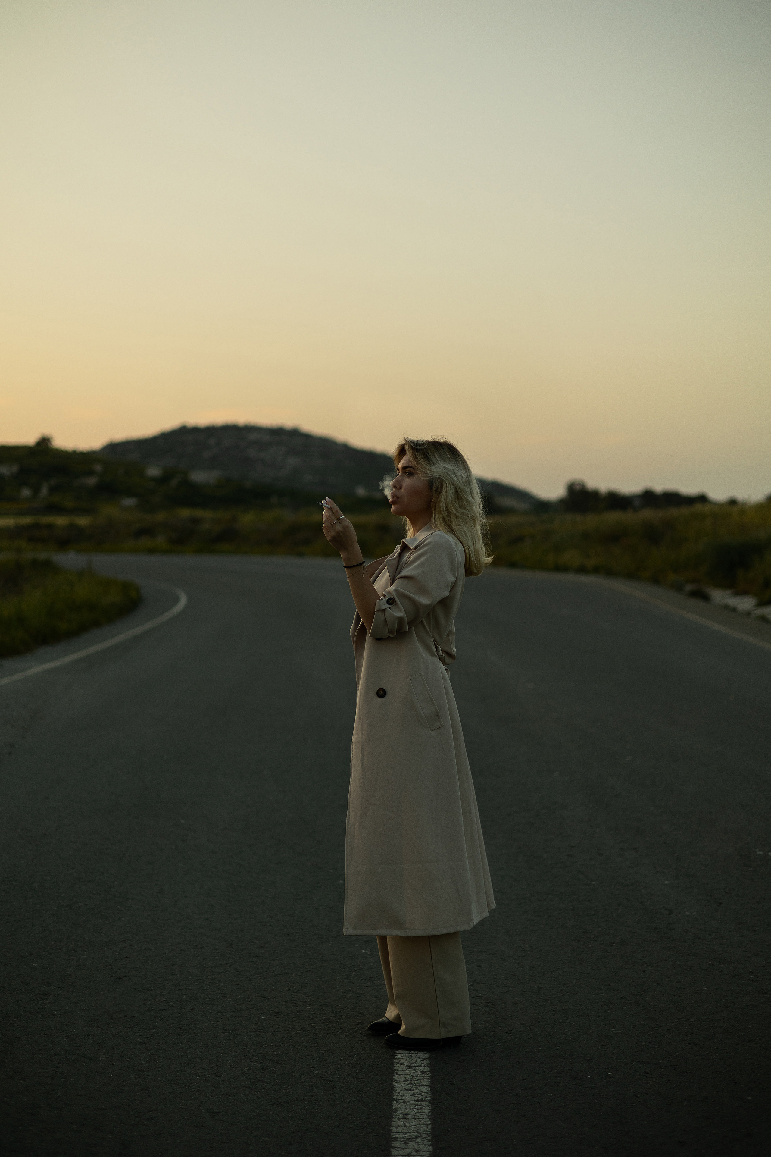 Cinematic Road Portraits — Woman in Trench Coat at Sunset. Kristina Kozheltsova- Soulful Portrait&Lifestyle&Love Story Photographer in Leipzig, Germany
