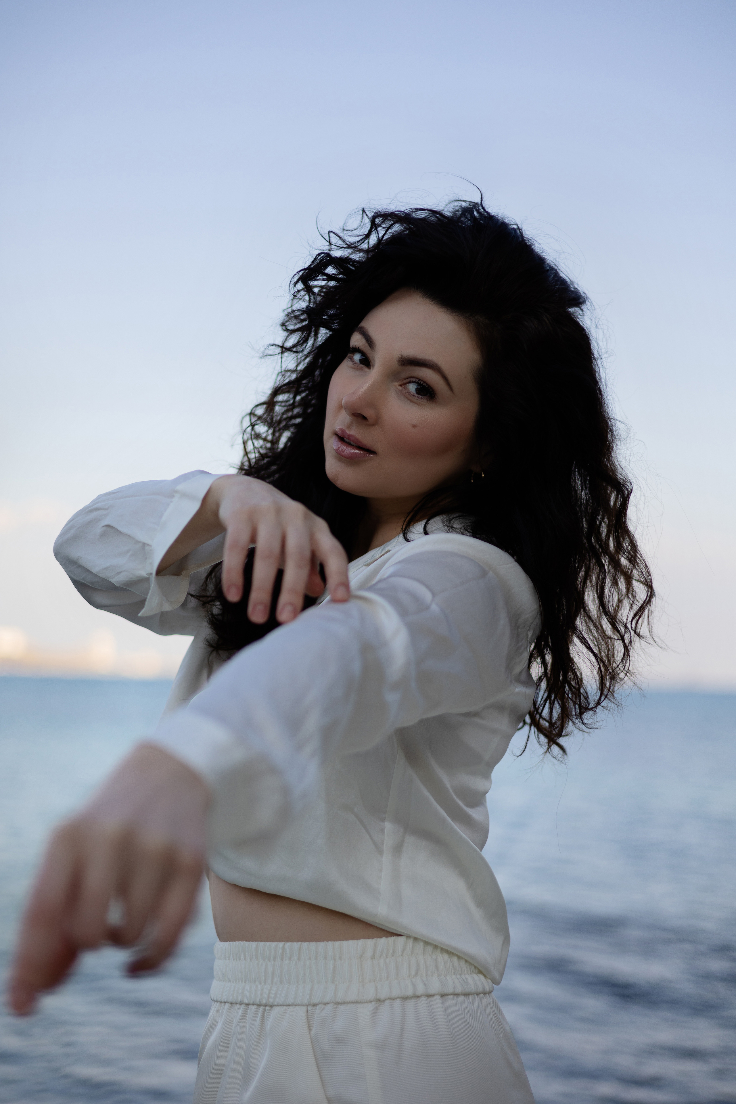 Coastal Portraits. Woman in White by the Sea. Kristina Kozheltsova- Soulful Portrait&Lifestyle&Love Story Photographer in Leipzig, Germany