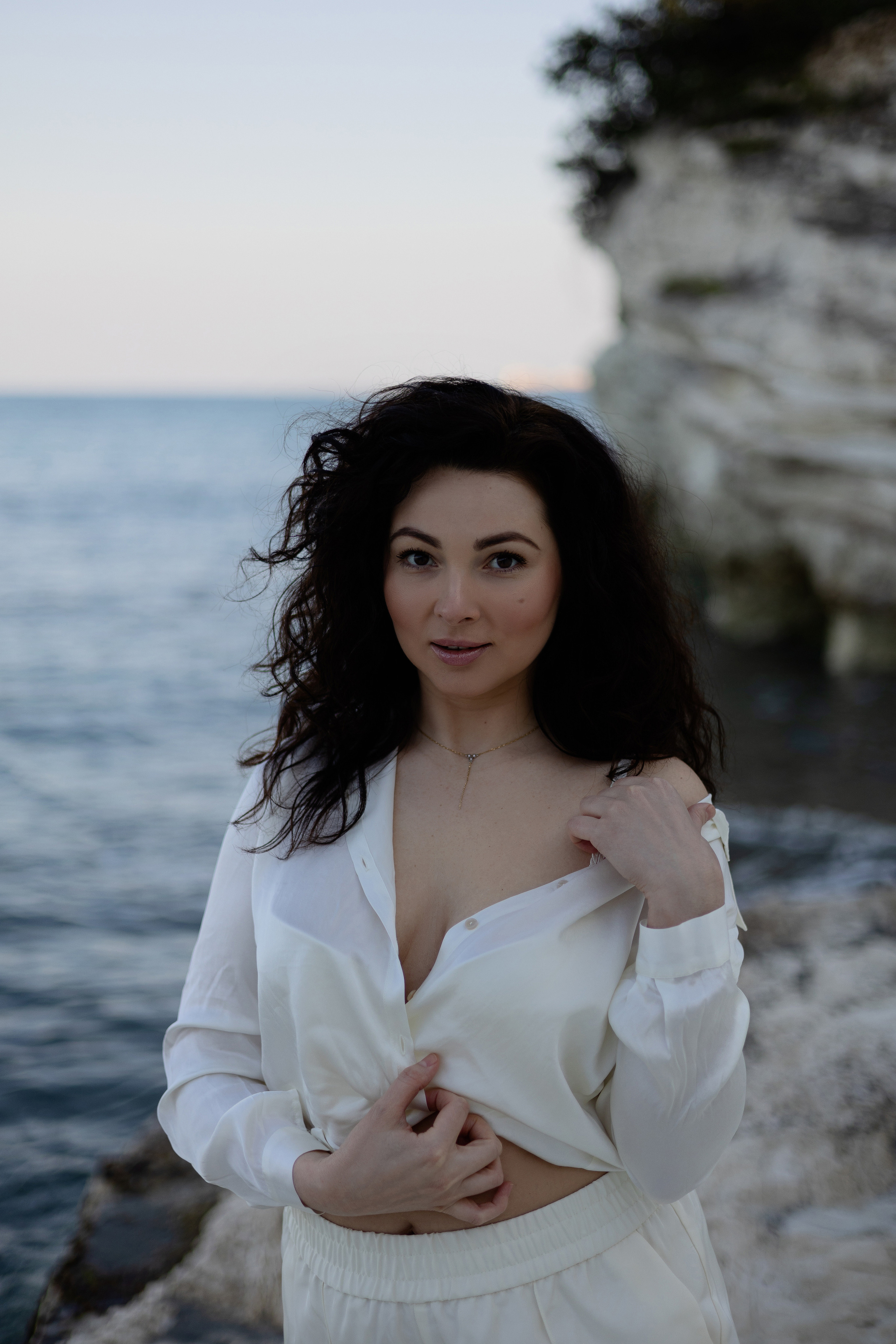 Coastal Portraits. Woman in White by the Sea. Kristina Kozheltsova- Soulful Portrait&Lifestyle&Love Story Photographer in Leipzig, Germany