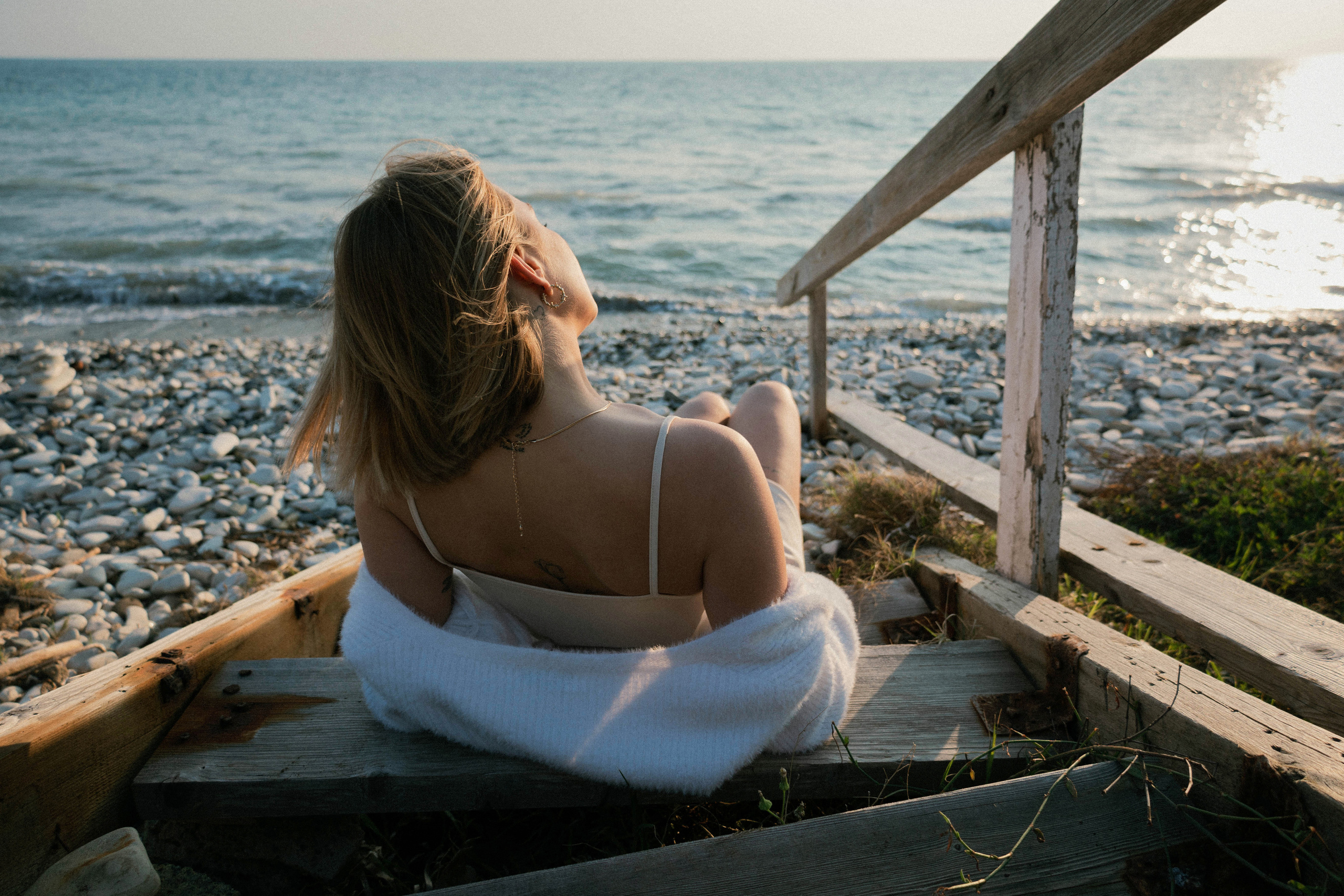Seaside Portraits. Woman by the Morning Light. Kristina Kozheltsova- Soulful Portrait&Lifestyle&Love Story Photographer in Leipzig, Germany