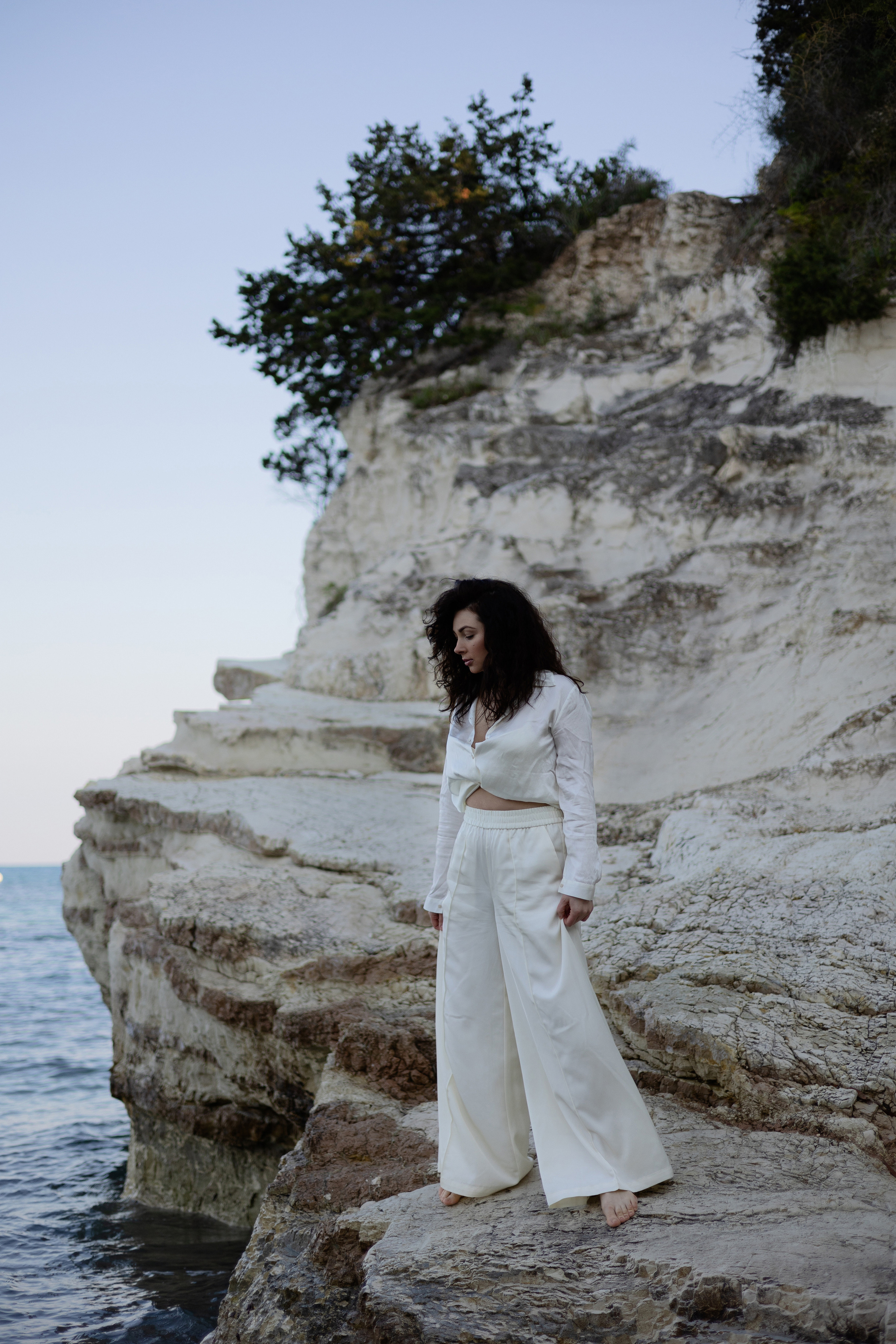 Coastal Portraits. Woman in White by the Sea. Kristina Kozheltsova- Soulful Portrait&Lifestyle&Love Story Photographer in Leipzig, Germany