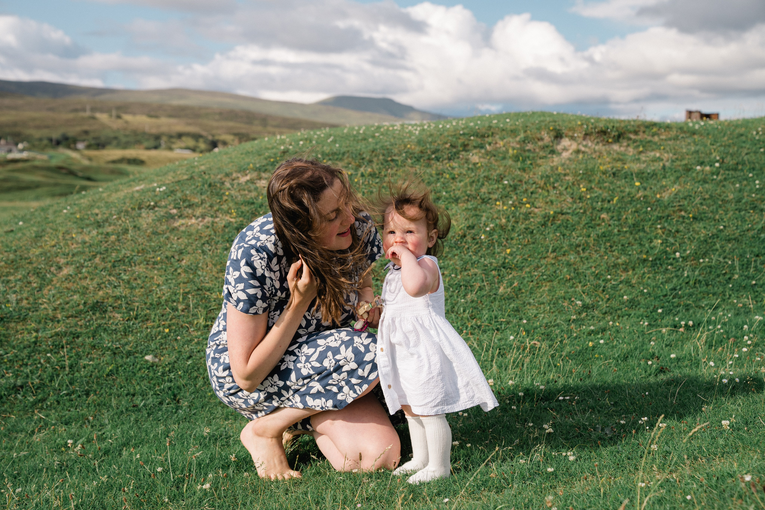 Darya and Mia at the ocean. Wedding and family photographer Ireland