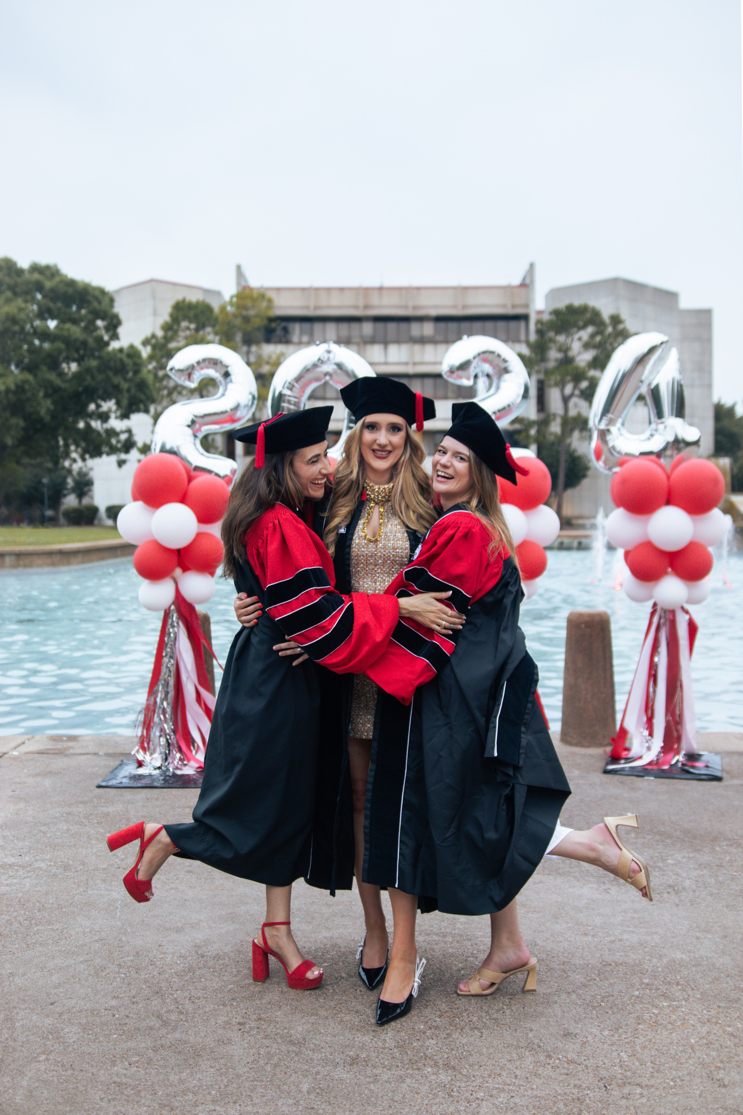 Group graduation photoshoot at the University of Houston
