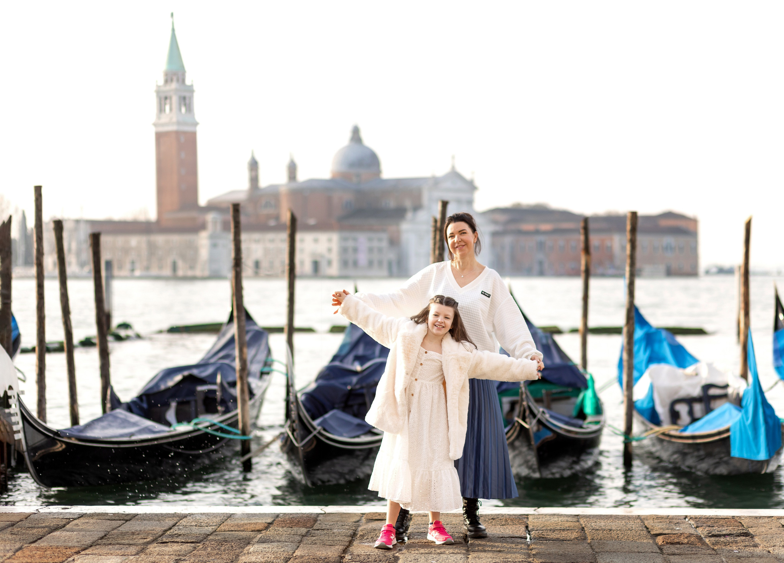 Mother and daughter at sunrise