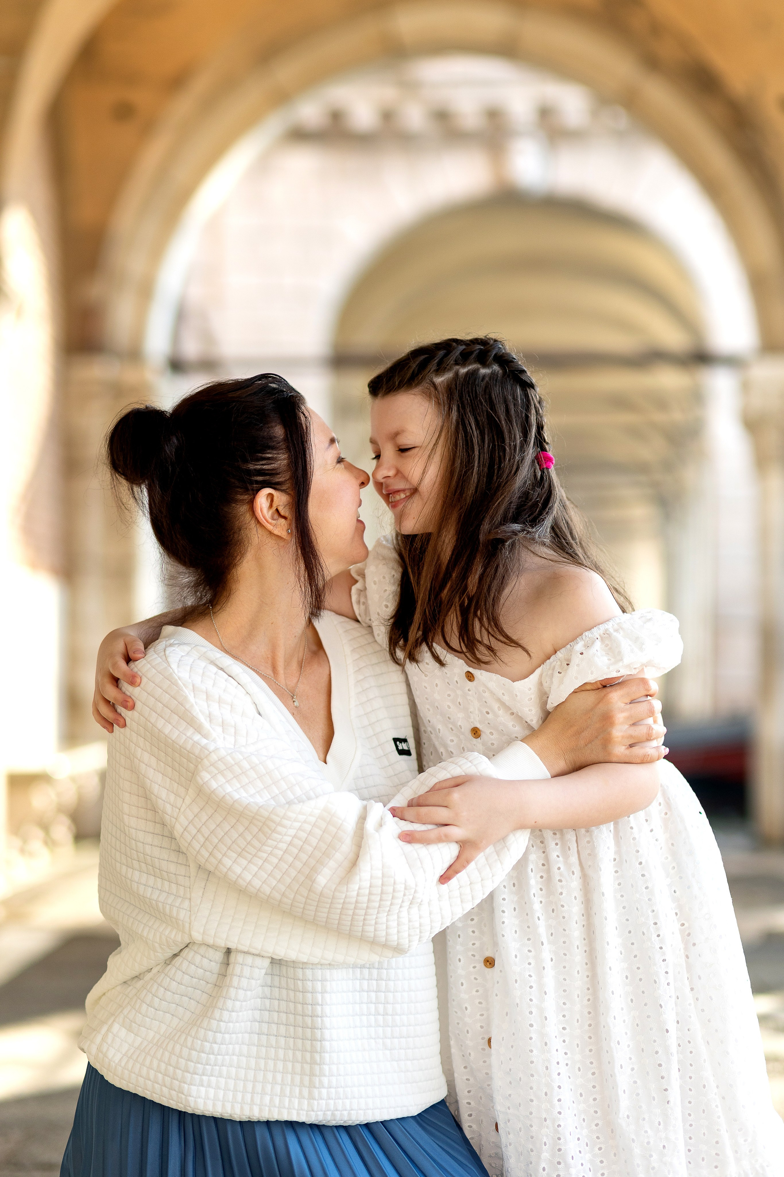 Mother and daughter at sunrise