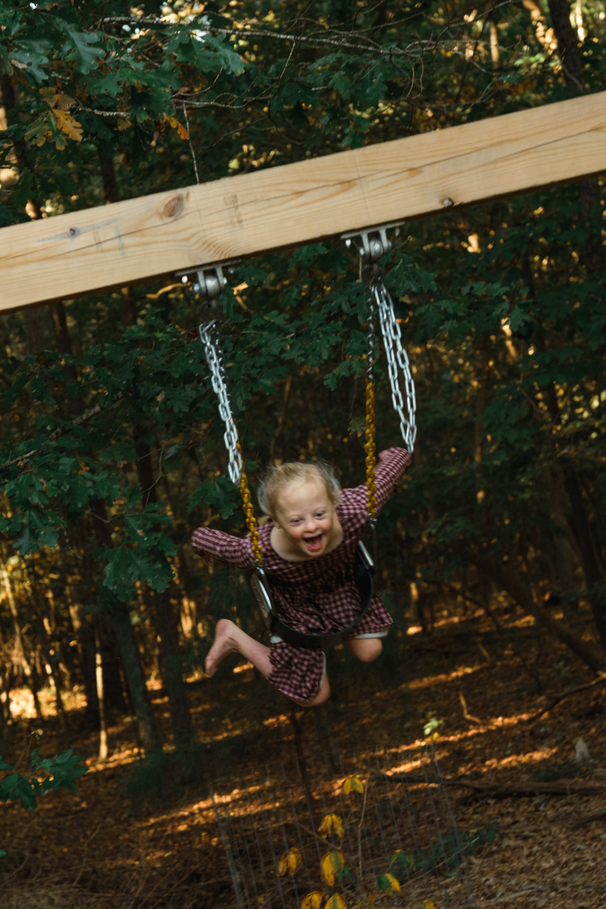 Special needs kids | Child with Dawn syndrome candid family photo session in Chester, VA