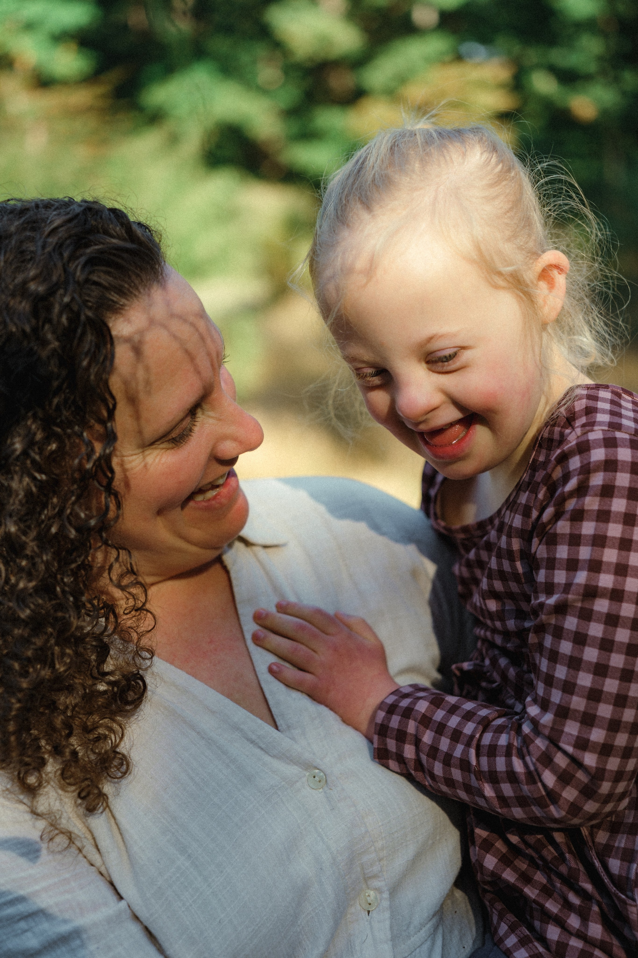 Special needs kids | Child with Dawn syndrome candid family photo session in Chester, VA