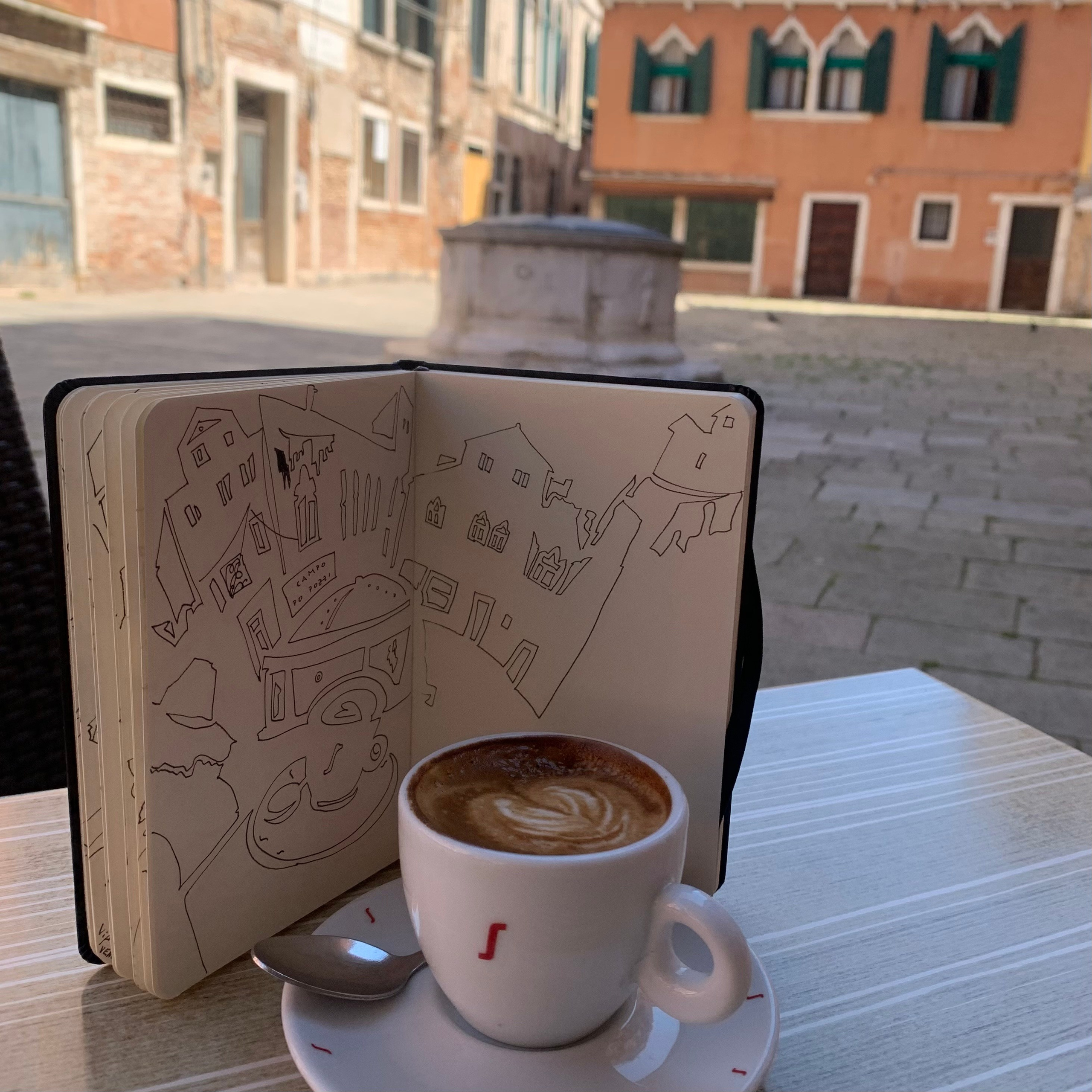 Moleskine notebook with original drawings made in Venice, research on paper for an editorial project by an artist who lives and works in Venice. Campo Do Pozzi and cappuccino