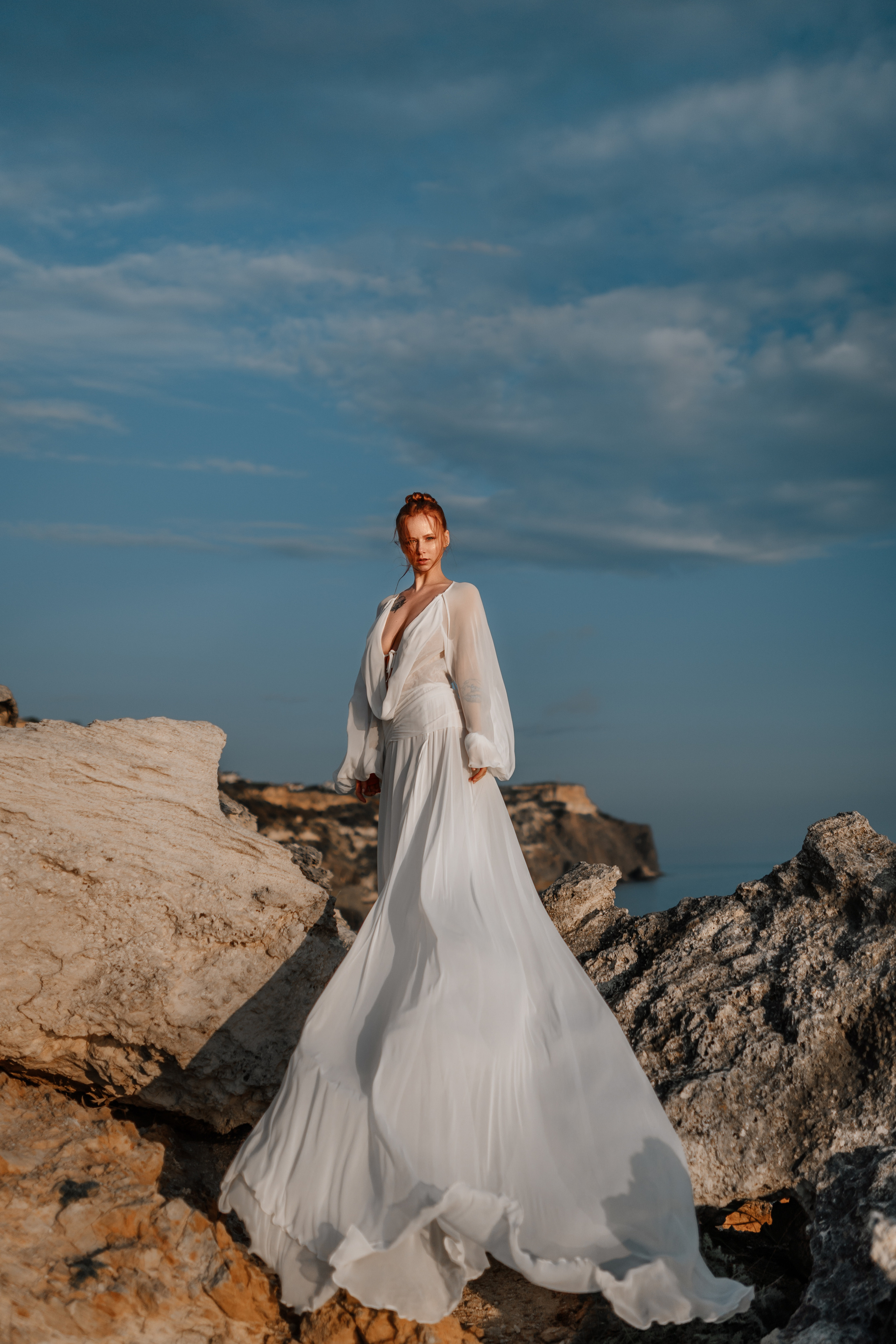 Phtooshooting at the rocky sea coast. Professional Photographer in Miami, Florida