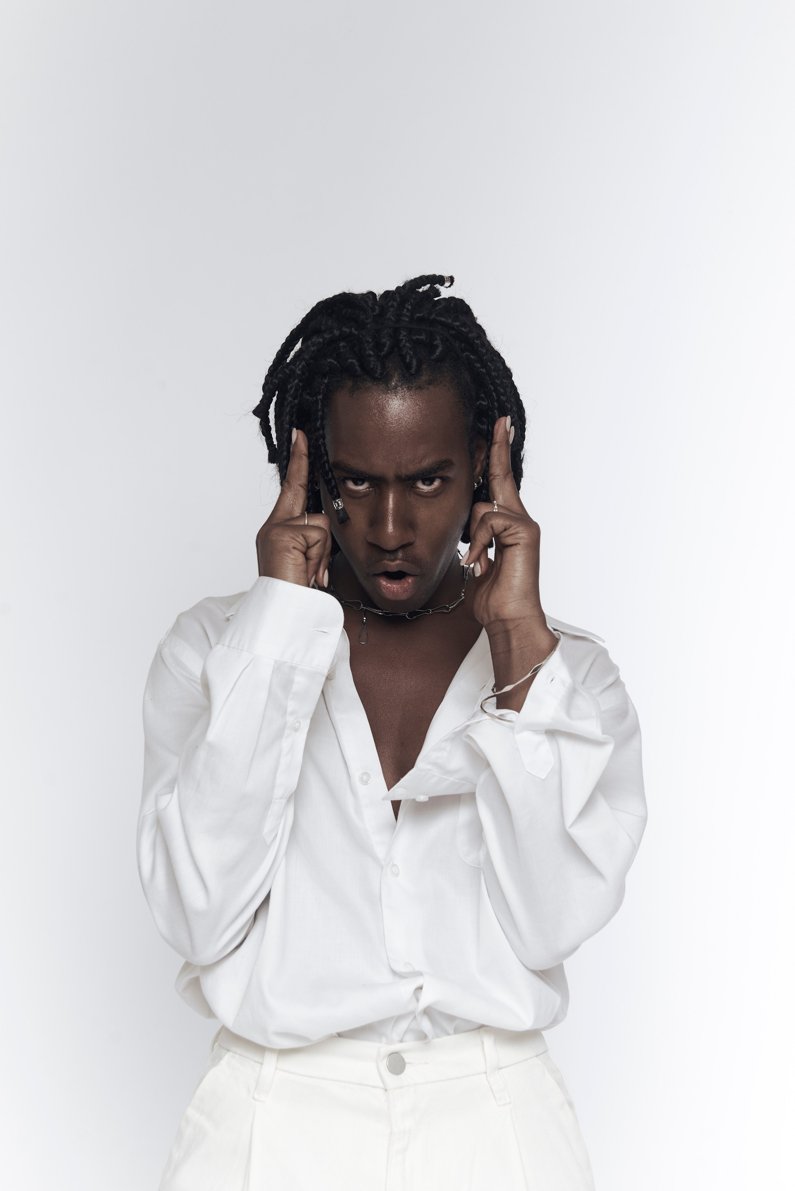 Stylish male portrait taken in a light-filled studio in Los Angeles