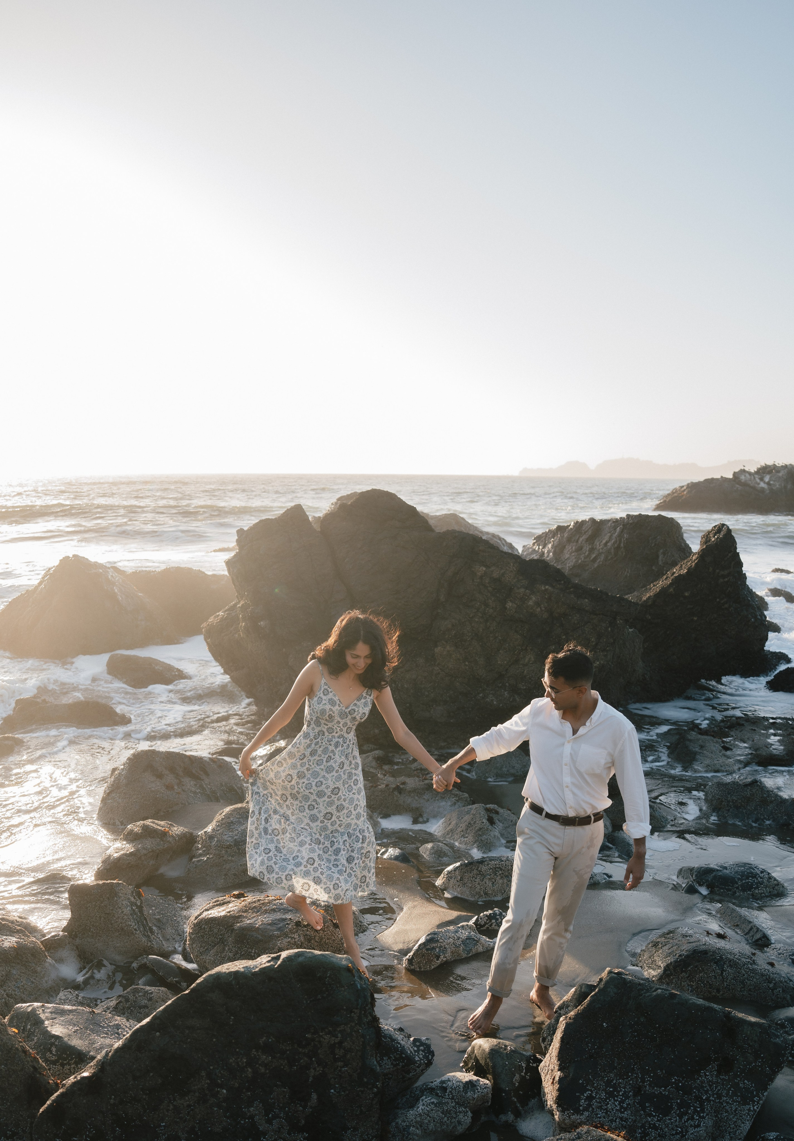 Engagement and Couple’s Photoshoot at Marshall’s Beach with iconic Golden Gate bridge view. Soulo Photography | San Francisco Bay Area Based Photographer