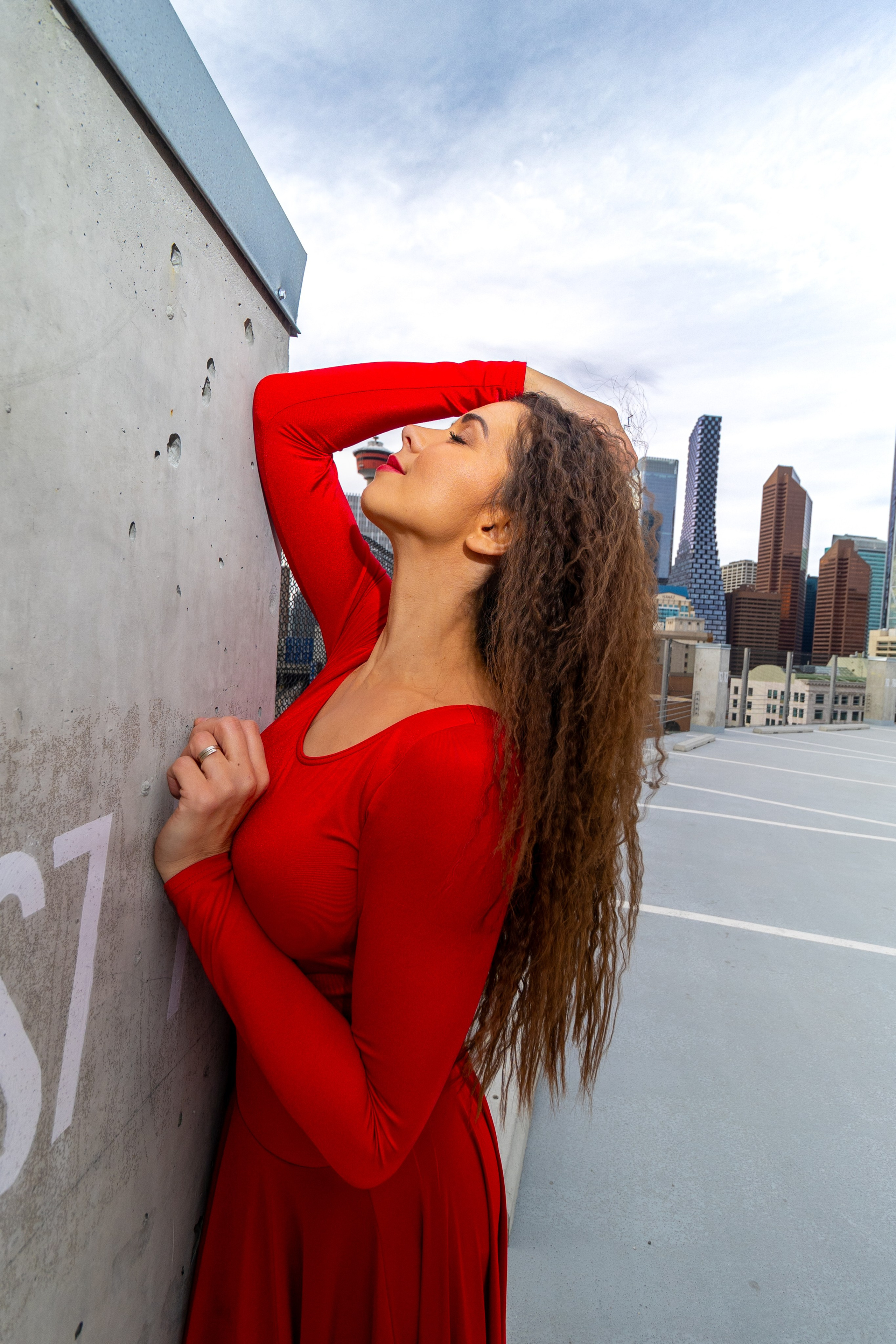Radiant Elegance: Pamela’s Breathtaking Photoshoot in Red. ProFly.club — Professional aerial filming in Calgary