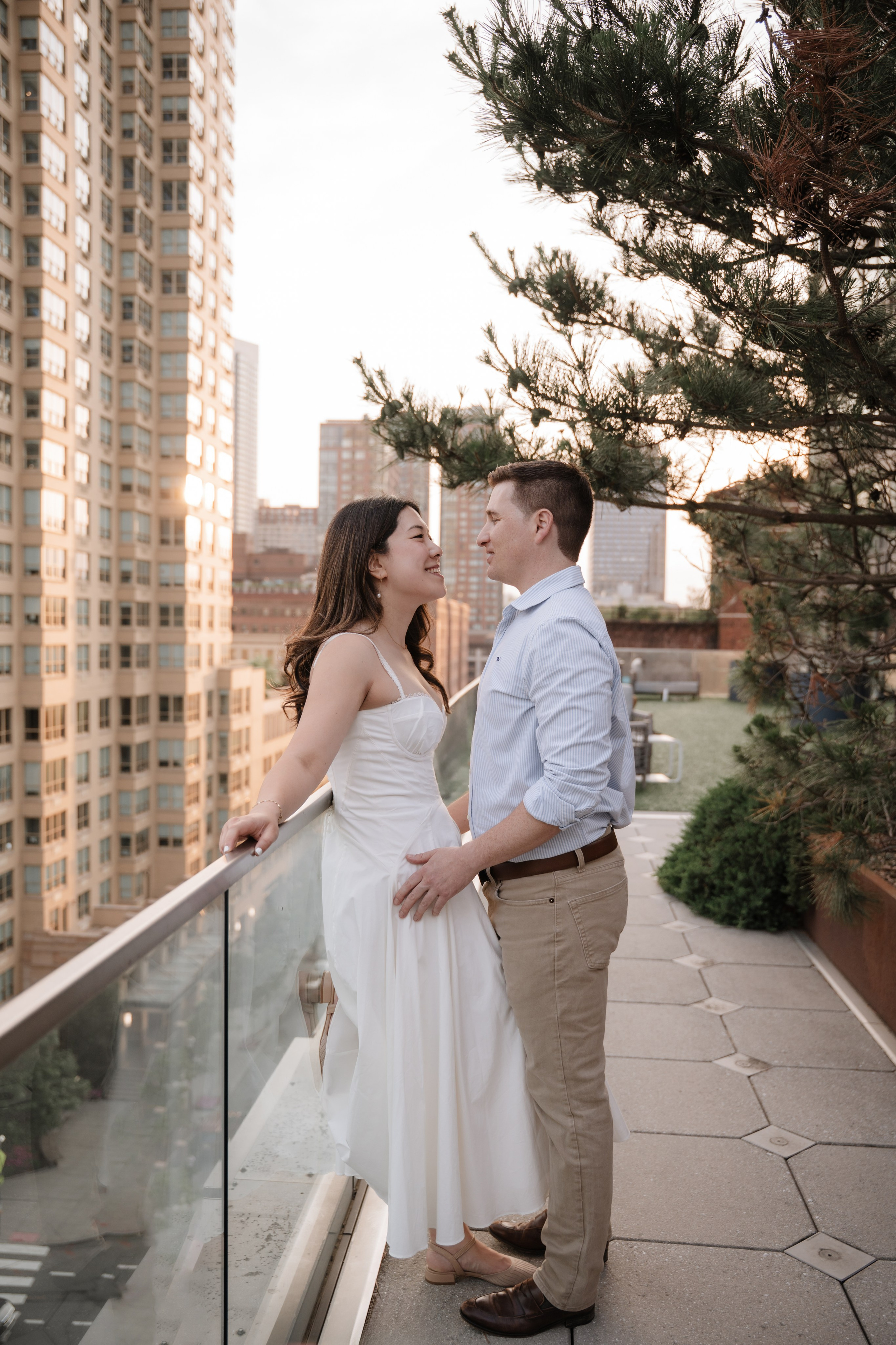 An adorable couple with their dog. Portrait and wedding photographer in New York