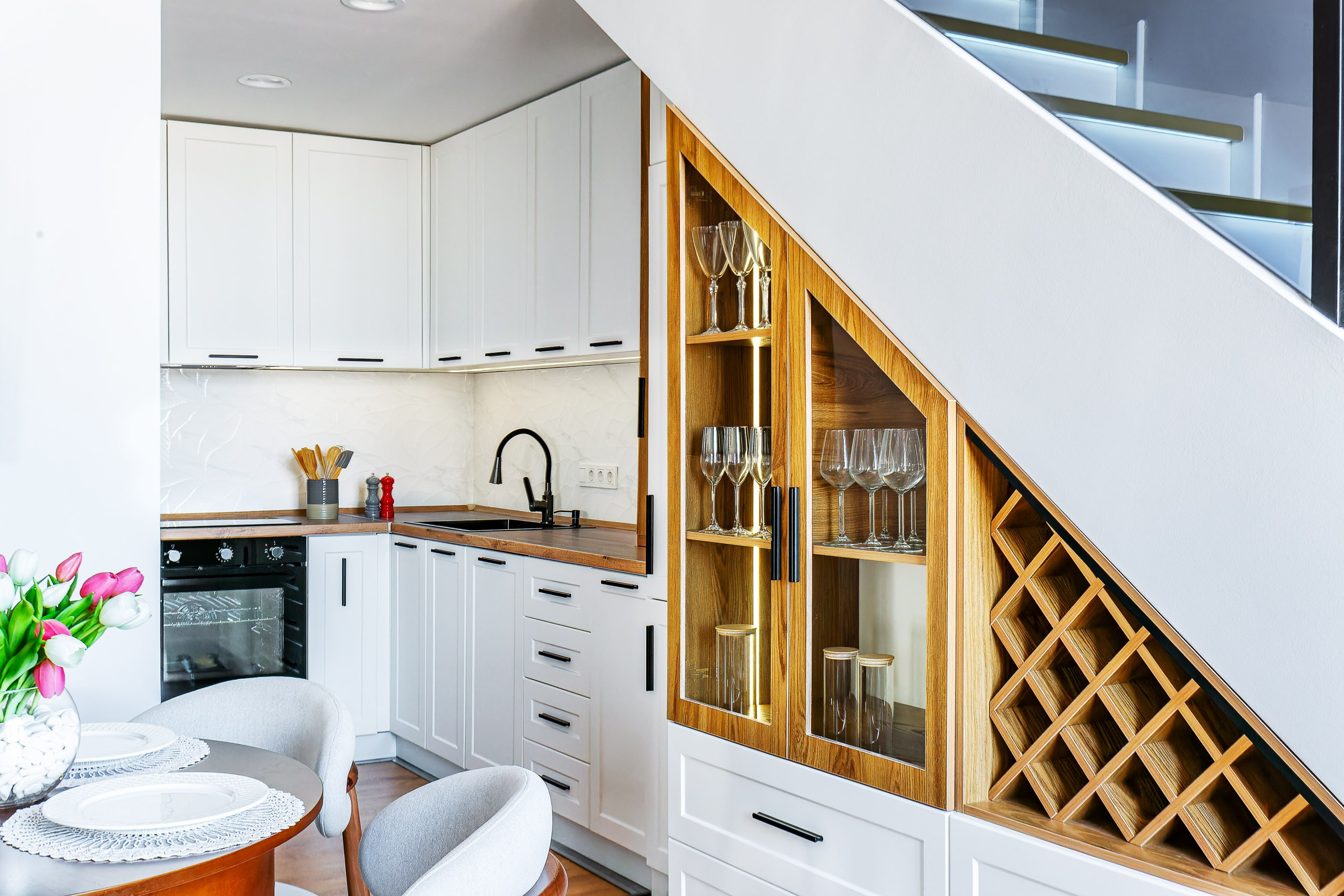 Interior photographer Uzbekistan — bright kitchen and dining area in minimalist style.