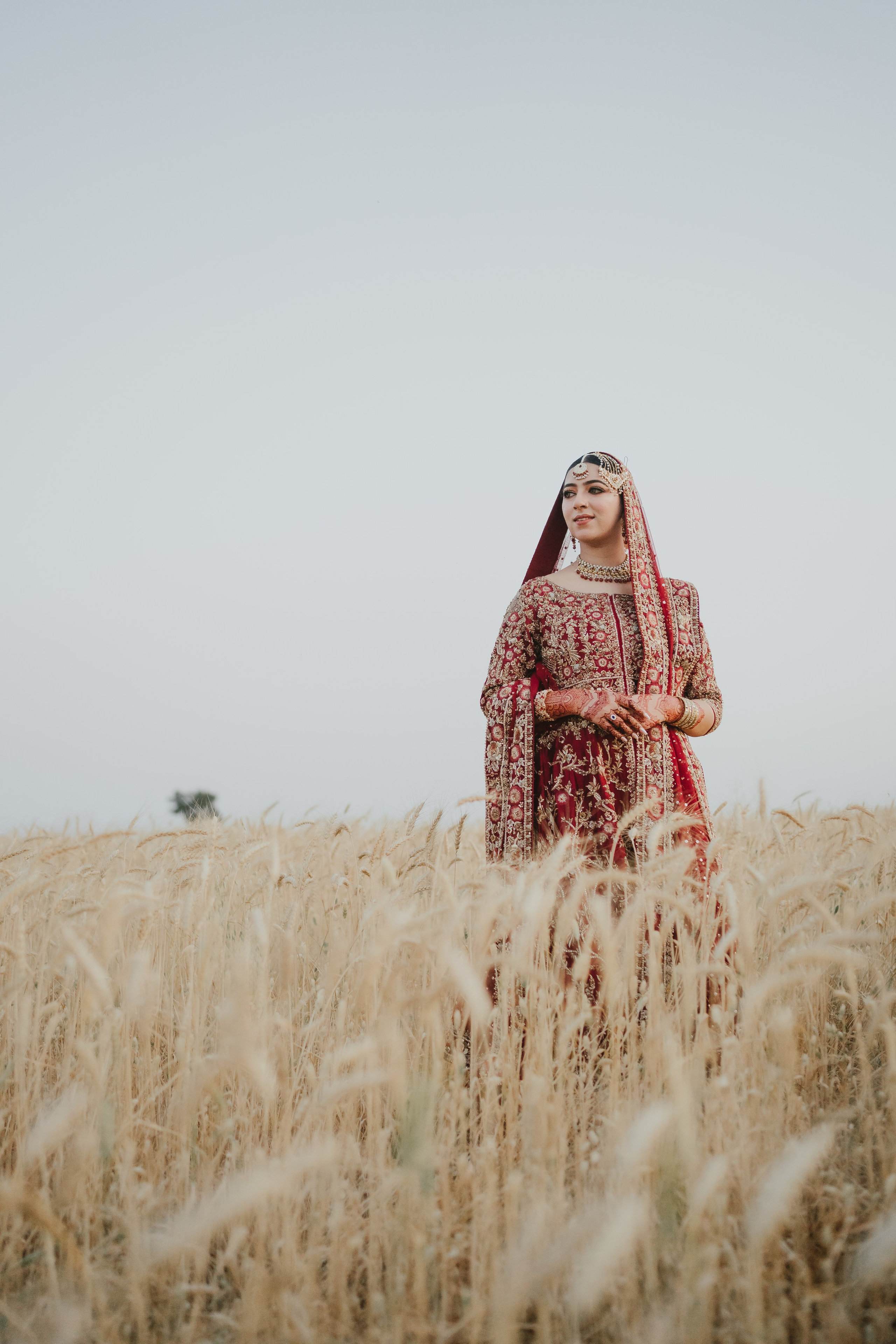 Couple shoot in the fields during sunset 