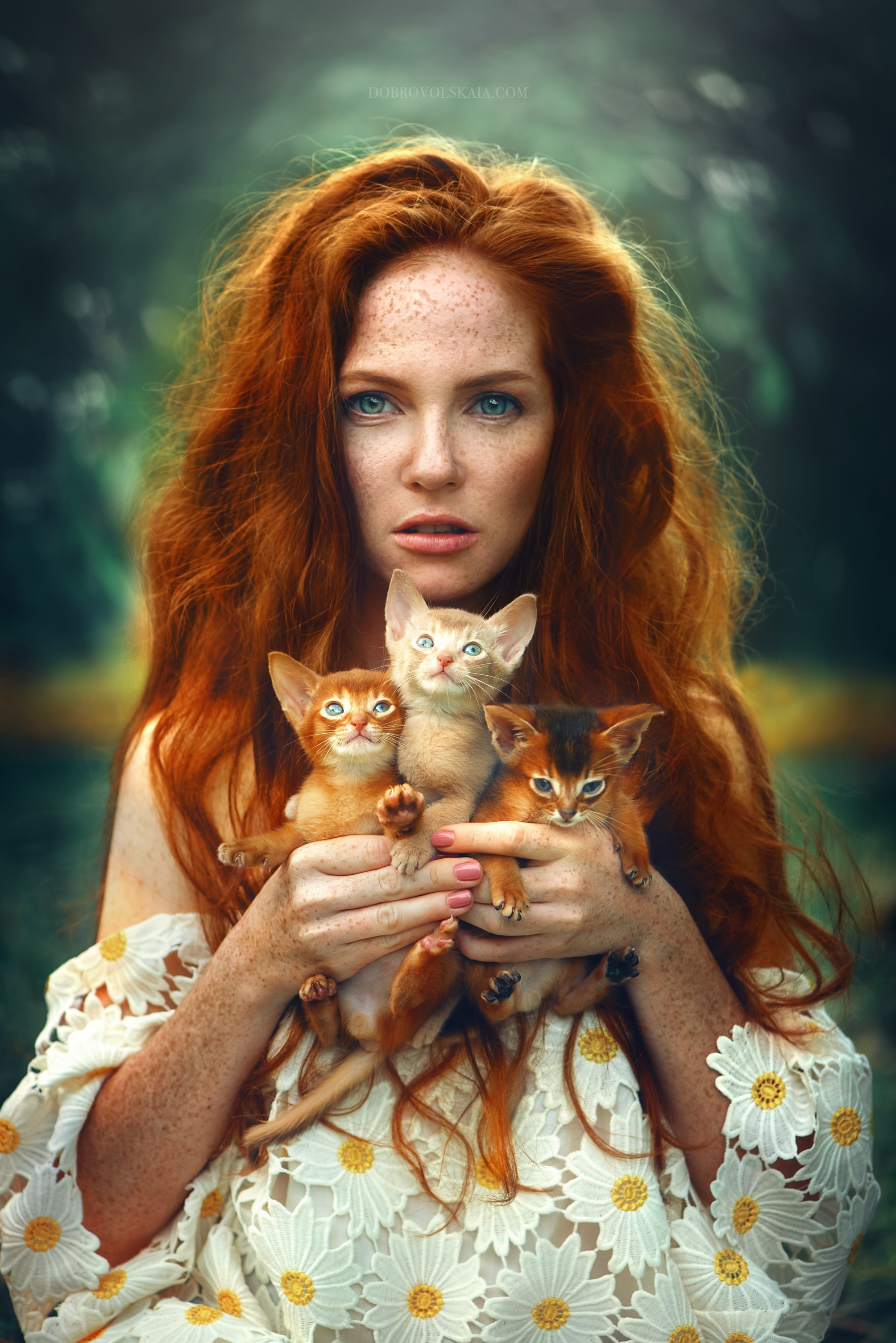 Woman gently cradling a tiny kitten in her arms. The kitten’s soft fur and the model’s tender touch convey a sense of warmth and care. This photograph emphasizes the nurturing bond that forms between people and their pets, showcasing the pure and innocent love shared with animals.