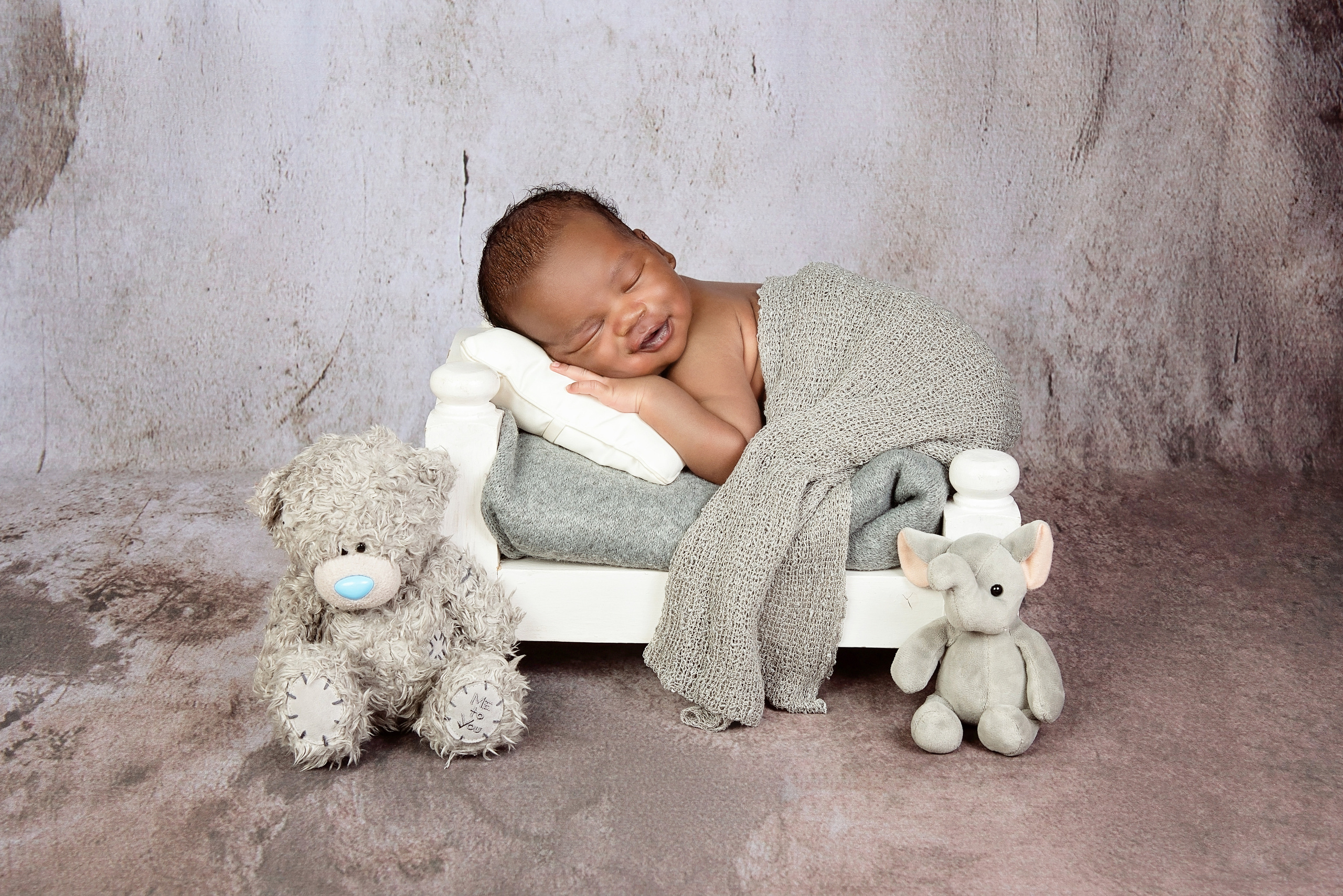 Black 2 weeks baby boy newborn laying in the bad Nairobi Nakuru Kenya